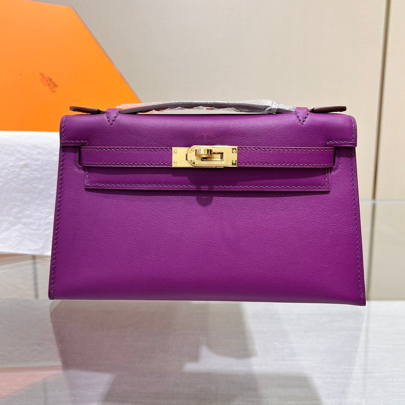 HM KELLY POCHETTE 22CM PURPLE SWIFT GOLD HARDWARE