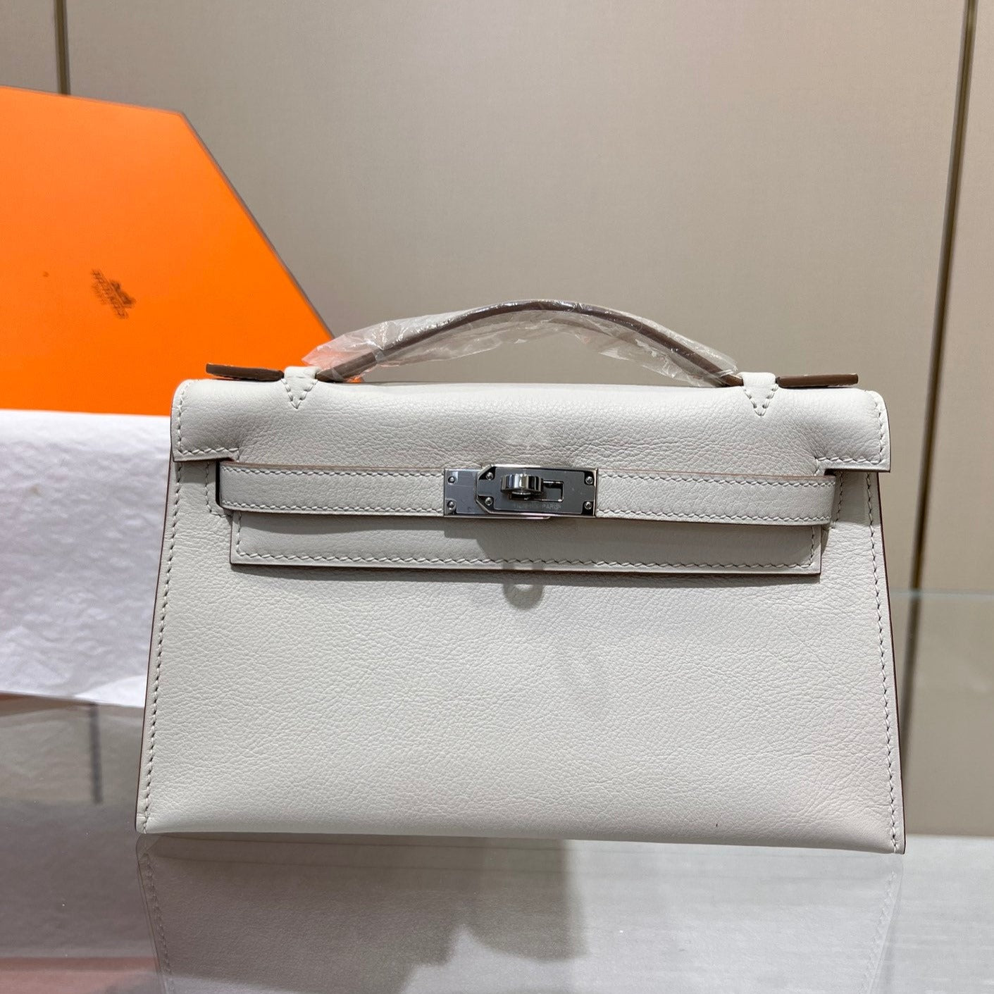 HM KELLY POCHETTE 22CM WHITE SWIFT SILVER HARDWARE