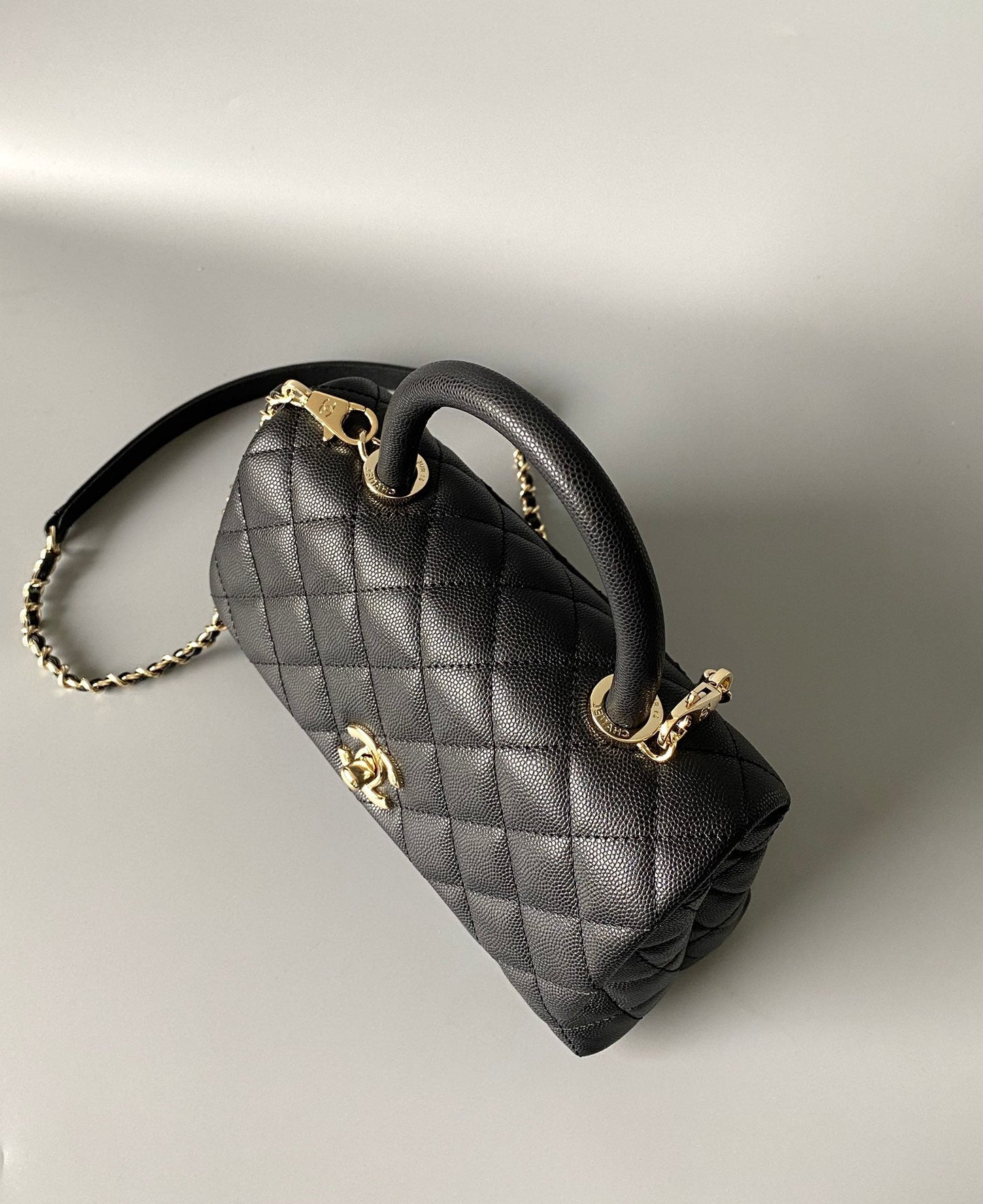 coco handle flap bag 23cm black quilted caviar light gold hardware