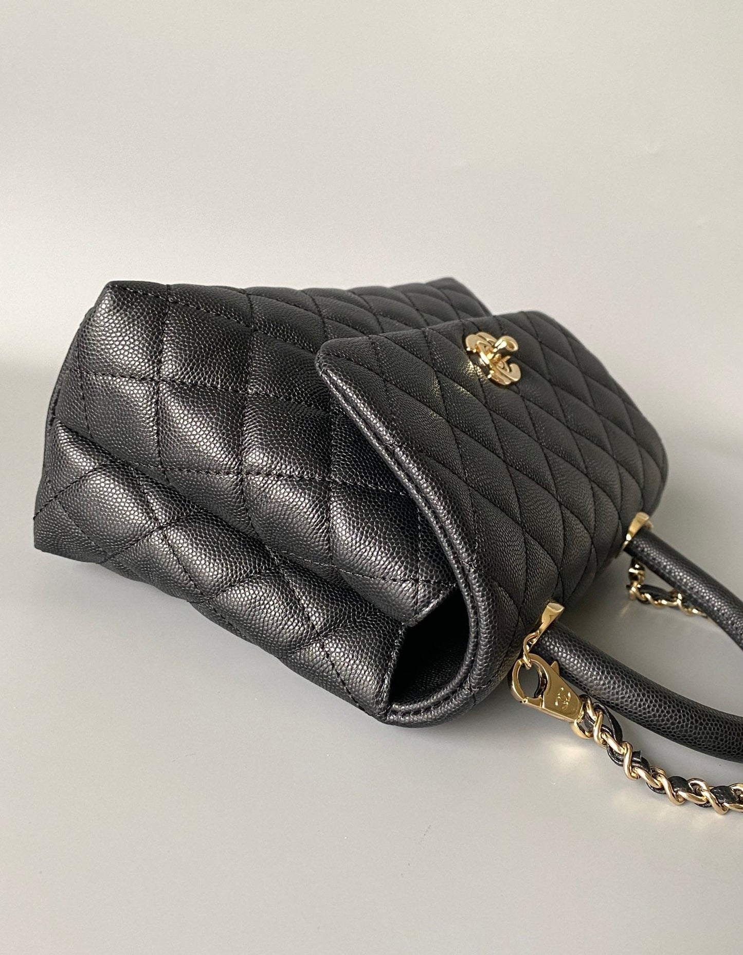 coco handle flap bag 23cm black quilted caviar light gold hardware