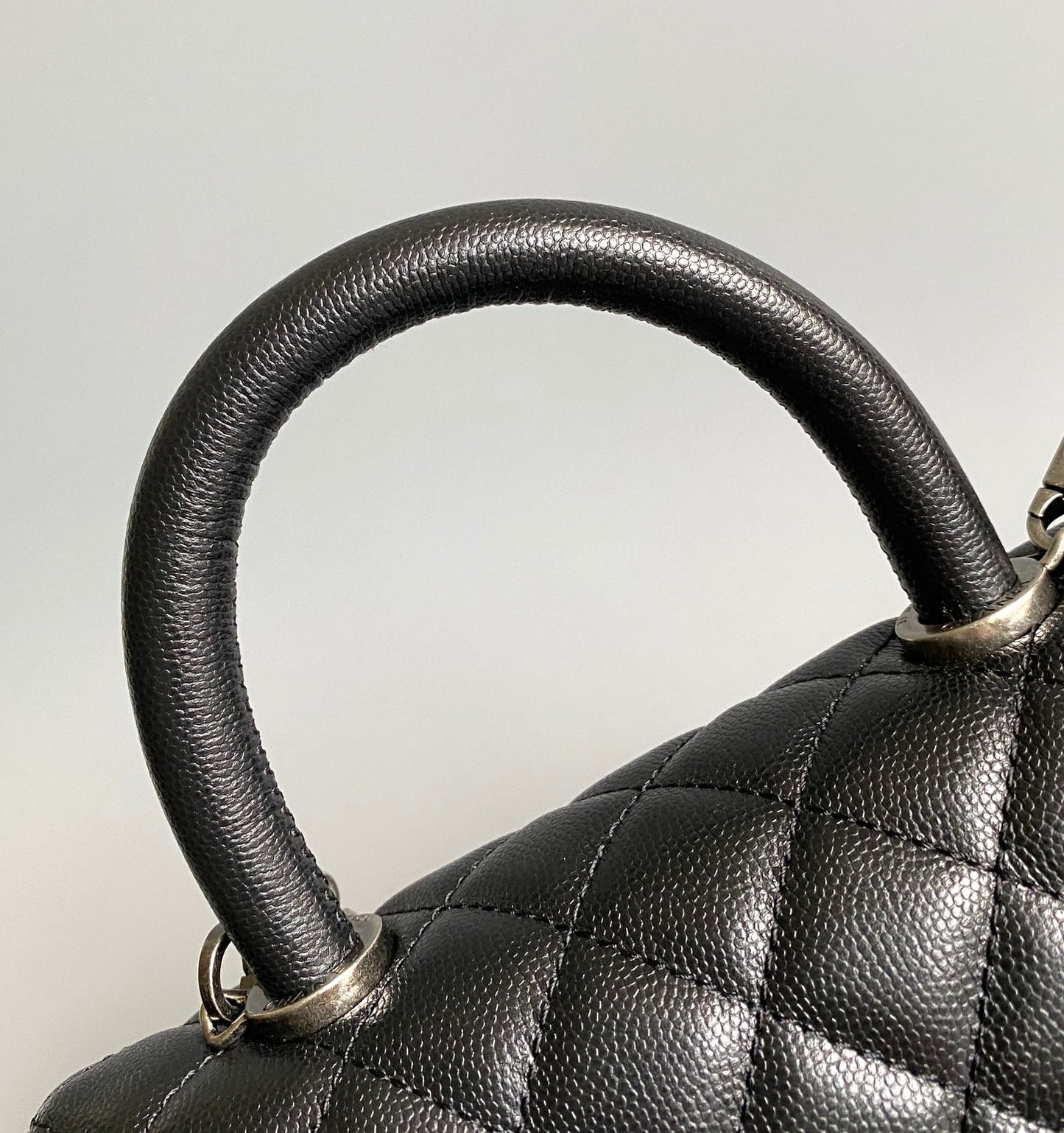 coco handle flap bag 23cm black quilted caviar black top handle