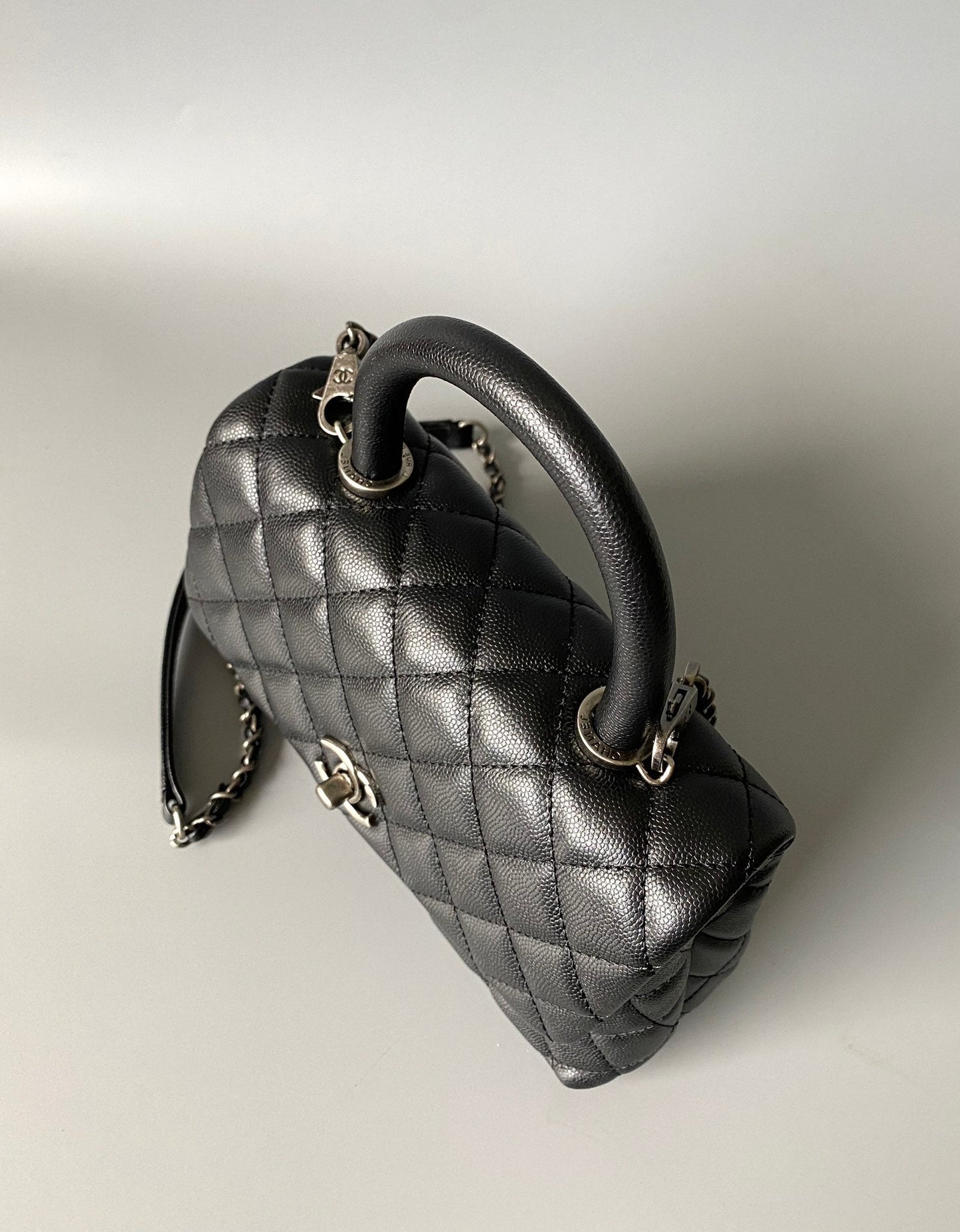 coco handle flap bag 23cm black quilted caviar black top handle