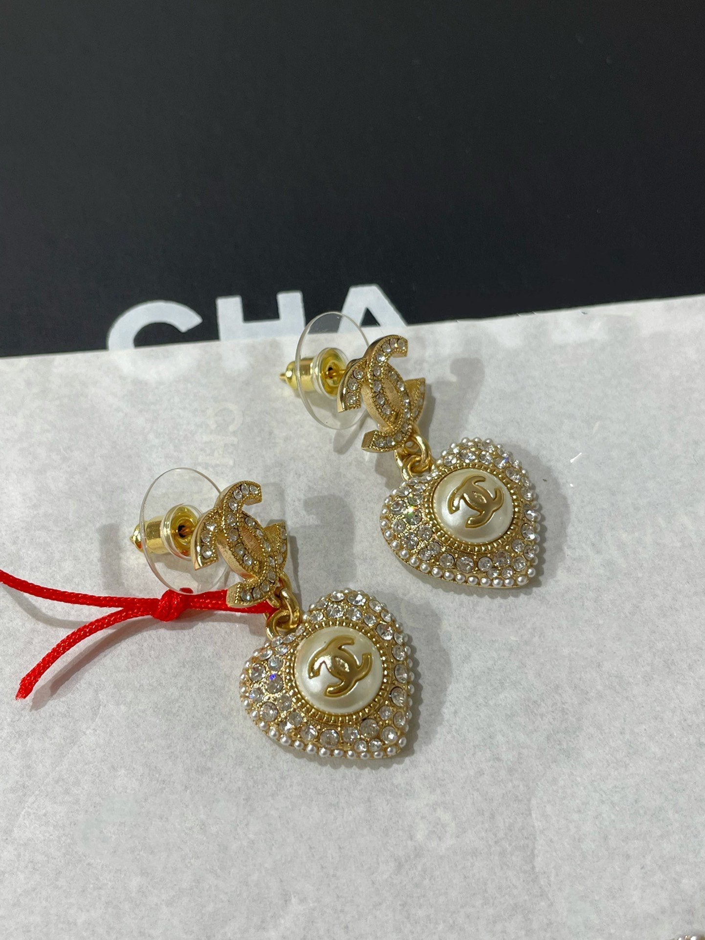 cc logo diamond paved heart mop drop earrings