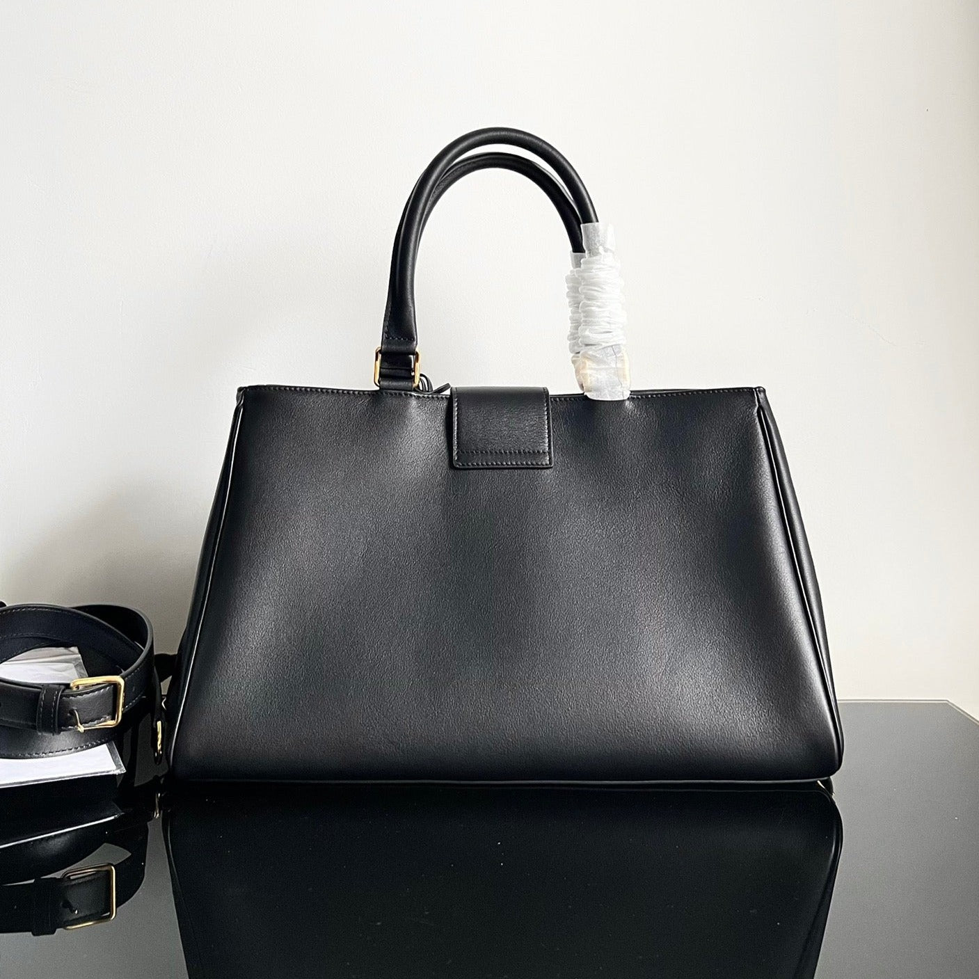 TRIOMPHE 37 BLACK SOFT CALFSKIN HANDBAG