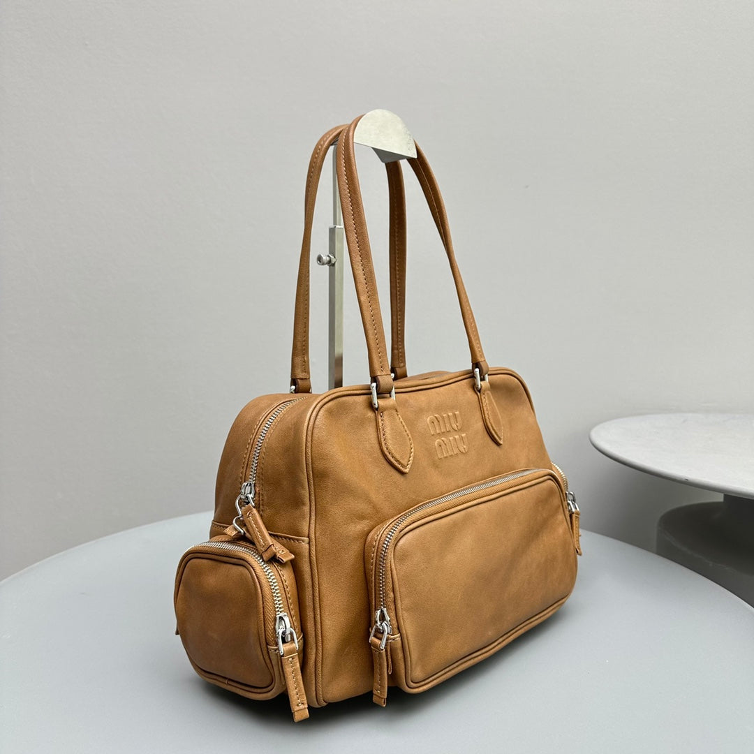 BIKER BAG 31 IN CARAMEL BROWN CALFSKIN