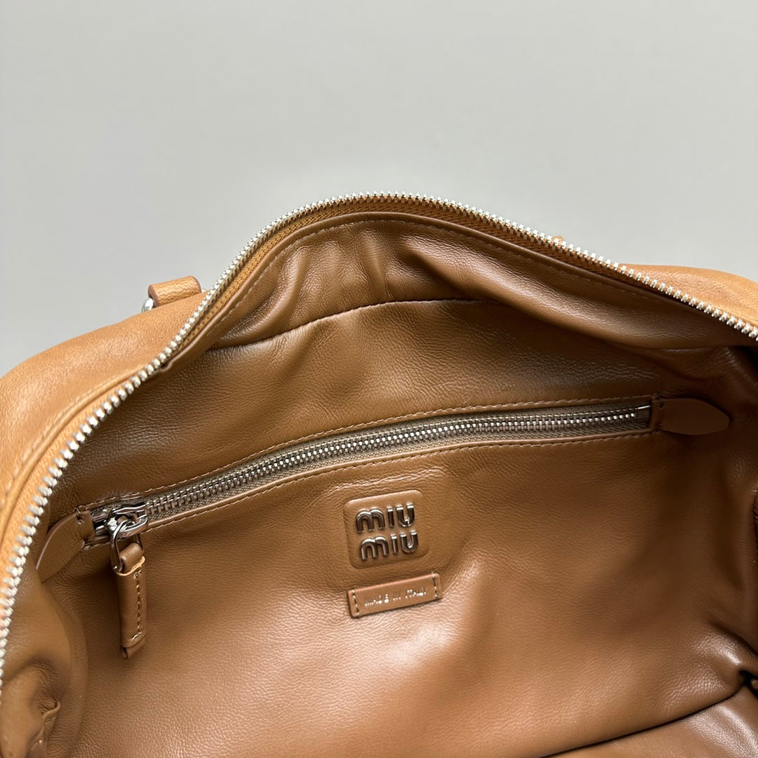 BIKER BAG 31 IN CARAMEL BROWN CALFSKIN