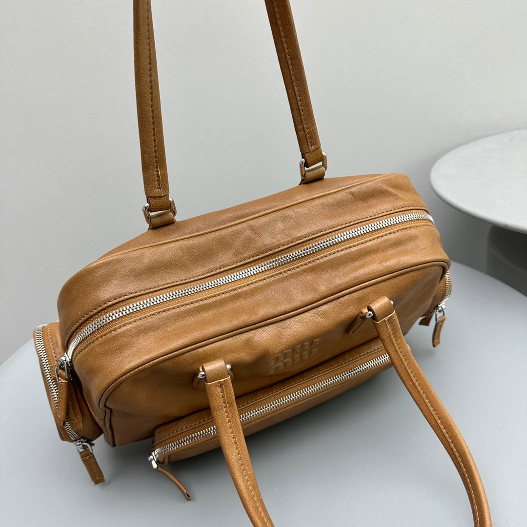 BIKER BAG 31 IN CARAMEL BROWN CALFSKIN