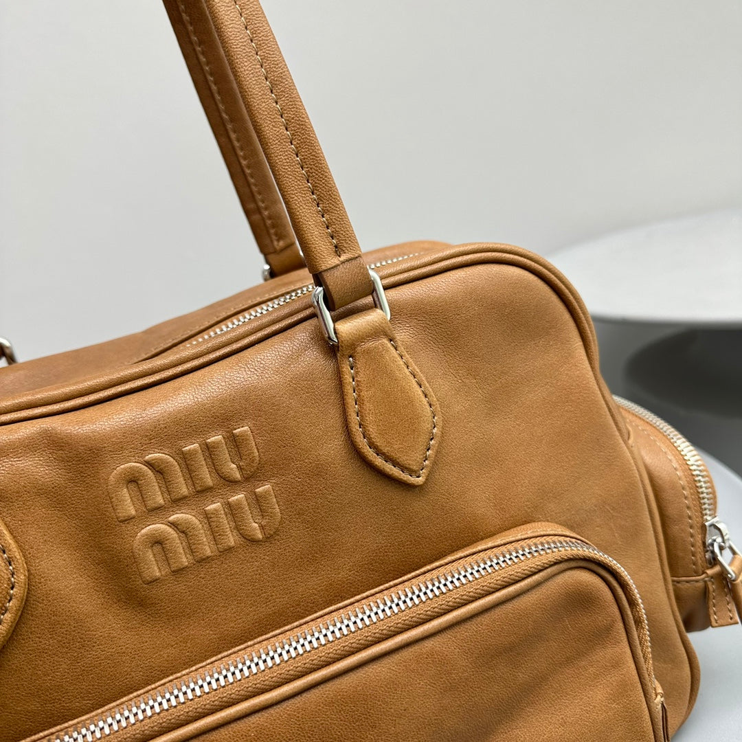 BIKER BAG 31 IN CARAMEL BROWN CALFSKIN