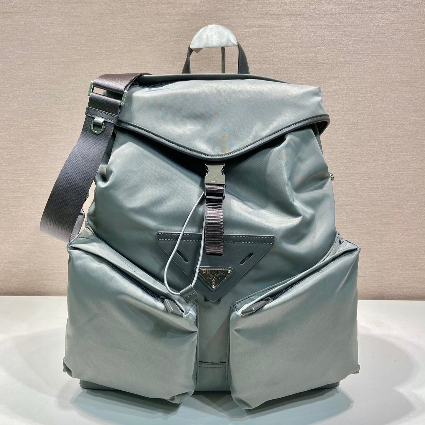 TRIANGLE LOGO BACKPACK 45 IN ASH GRAY RE-NYLON