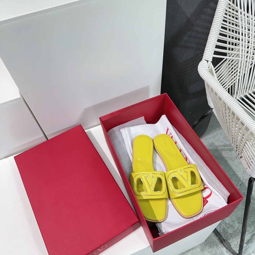 Vlogo Cut-Out Yellow Calfskin Slide Sandal