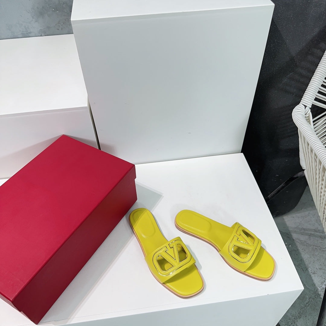 Vlogo Cut-Out Yellow Calfskin Slide Sandal