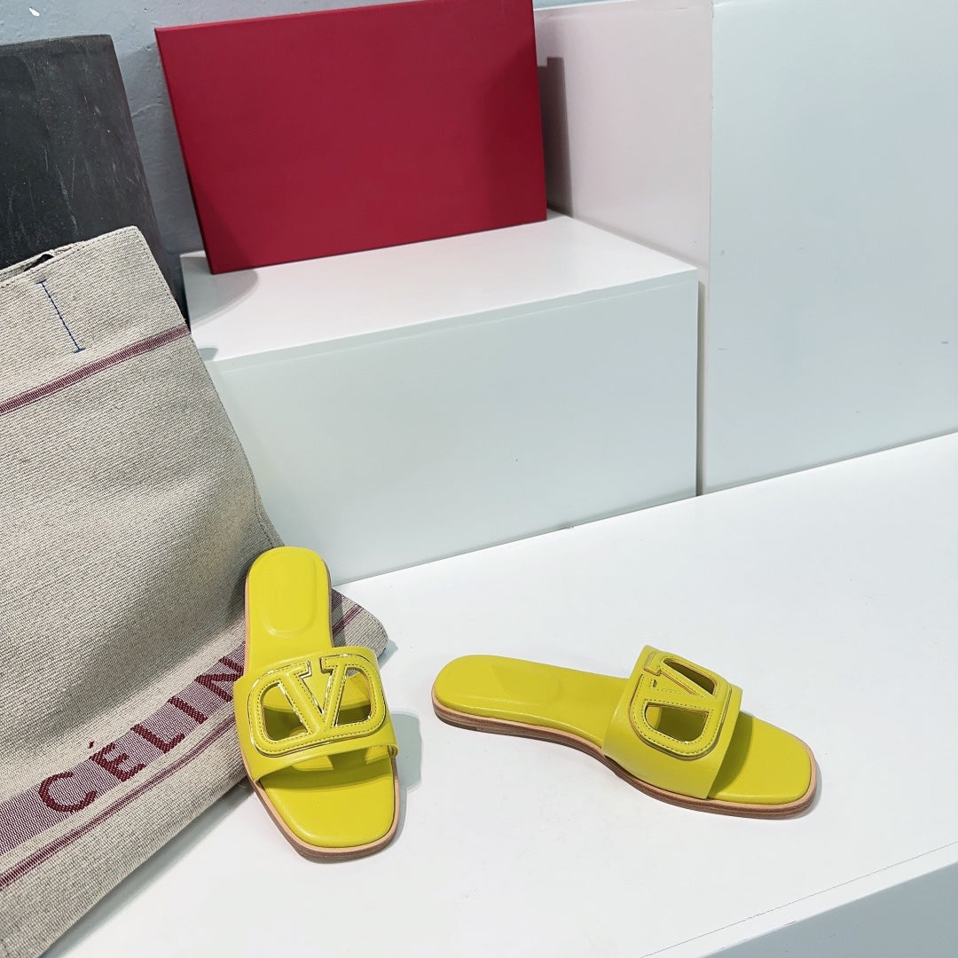 Vlogo Cut-Out Yellow Calfskin Slide Sandal