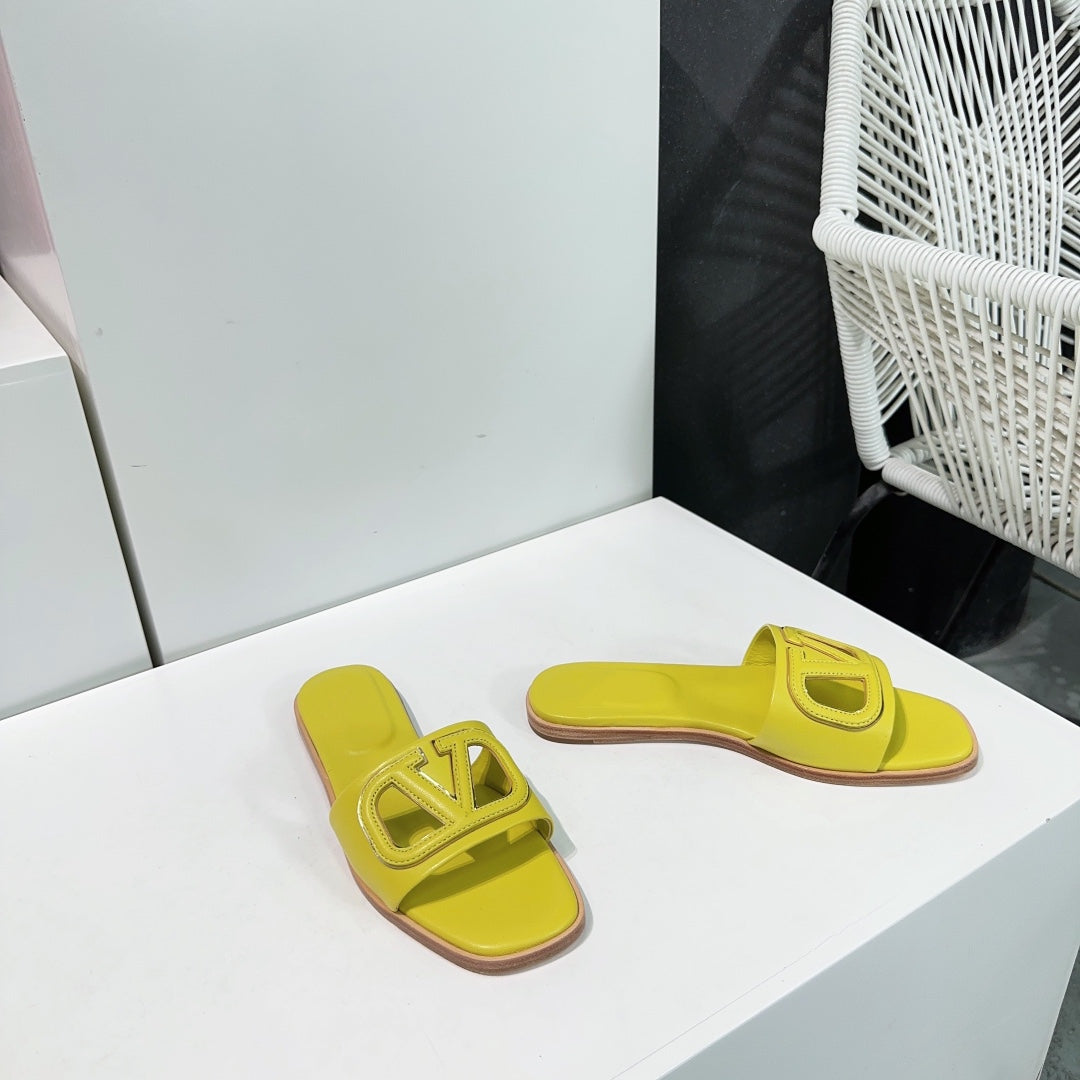 Vlogo Cut-Out Yellow Calfskin Slide Sandal