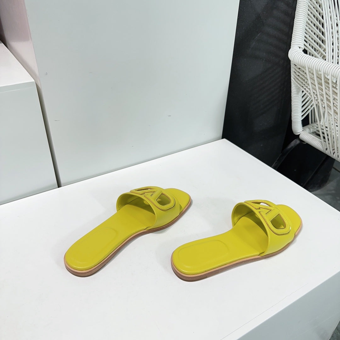 Vlogo Cut-Out Yellow Calfskin Slide Sandal