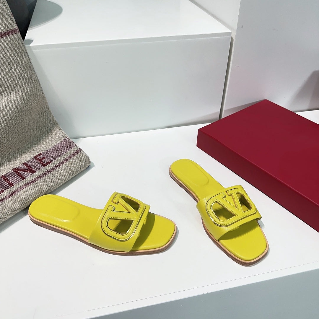 Vlogo Cut-Out Yellow Calfskin Slide Sandal