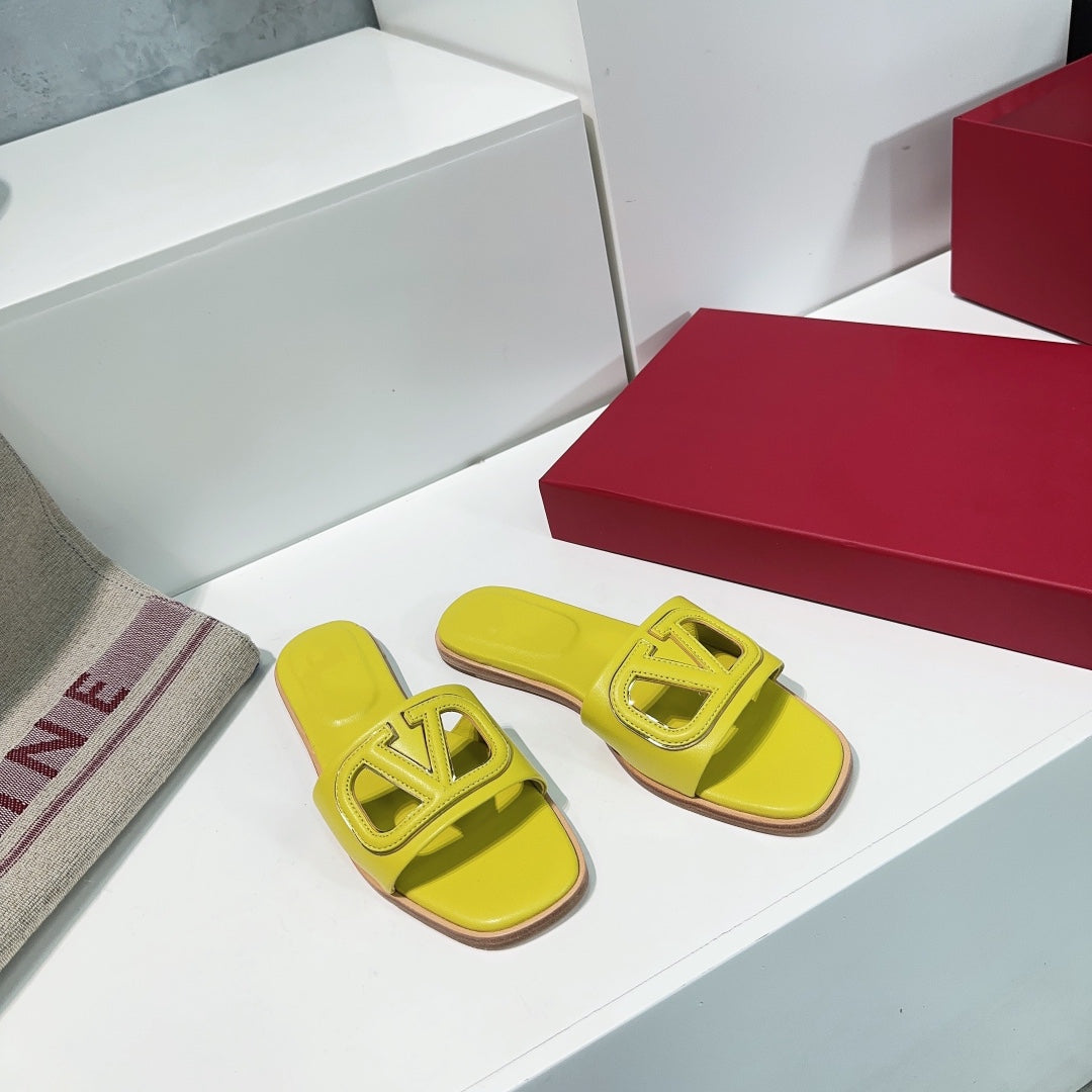 Vlogo Cut-Out Yellow Calfskin Slide Sandal