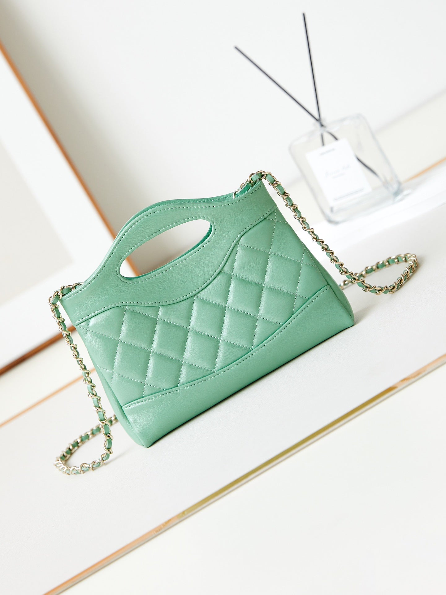 cc 24s31 nano shopping bag 17.5cm light green lambskin gold hardware