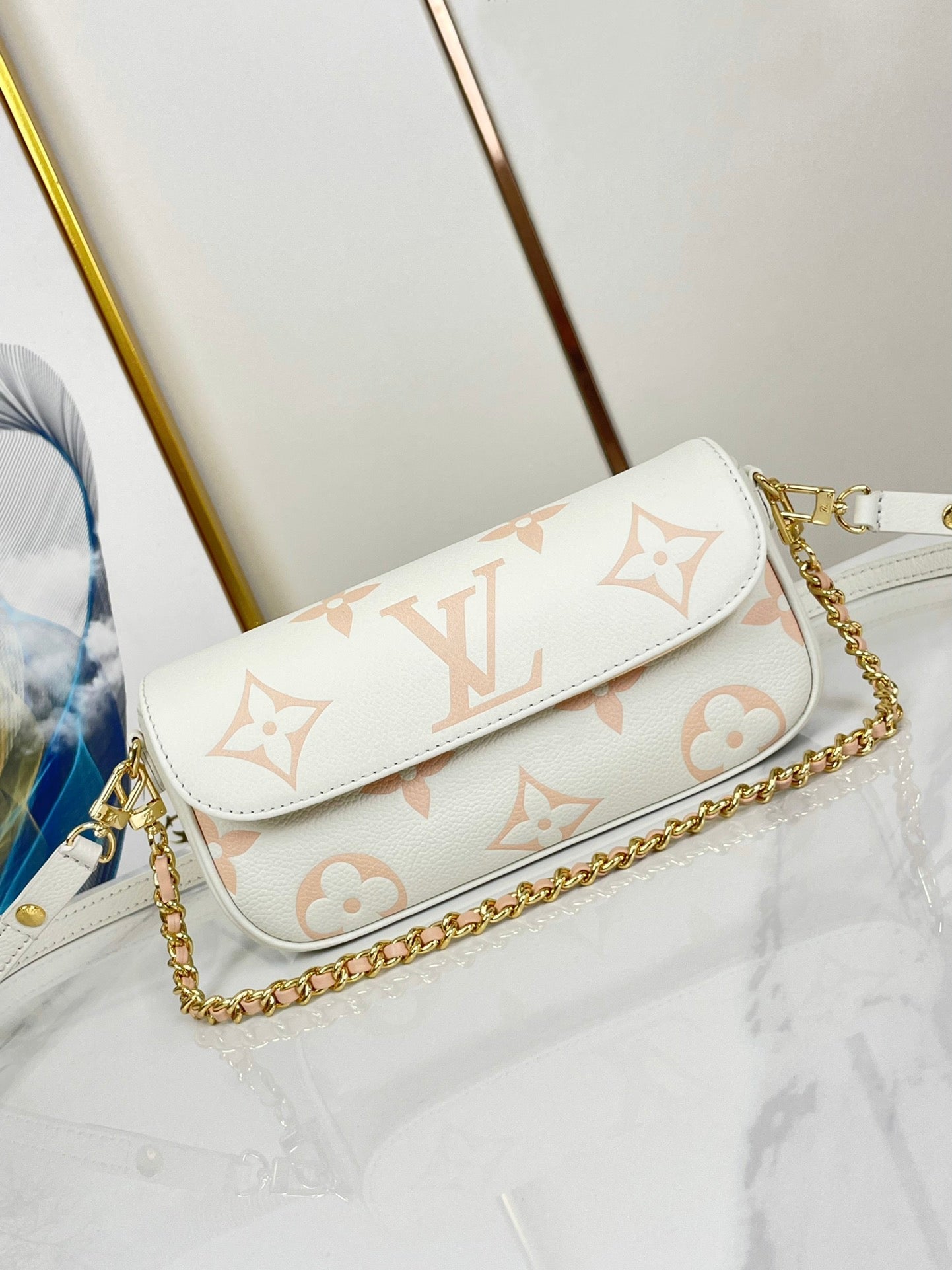 WALLET ON CHAIN IVY 23 IN WHITE PINK MONOGRAM EMPREINTE LEATHER