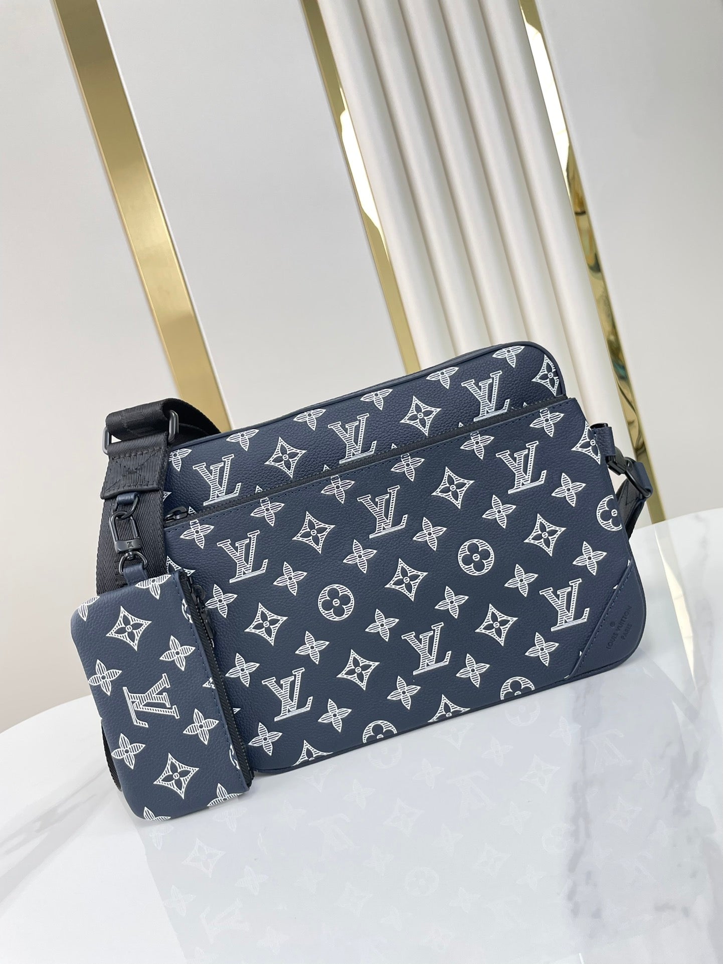 TRIO MESSENGER 25 IN PRUSSIAN BLUE MONOGRAM SHADOW CALFSKIN