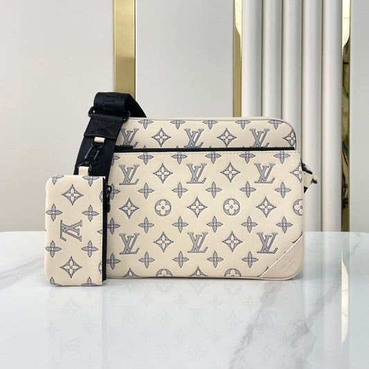 TRIO MESSENGER 25 IN CREAM BLUE MONOGRAM SHADOW CALFSKIN