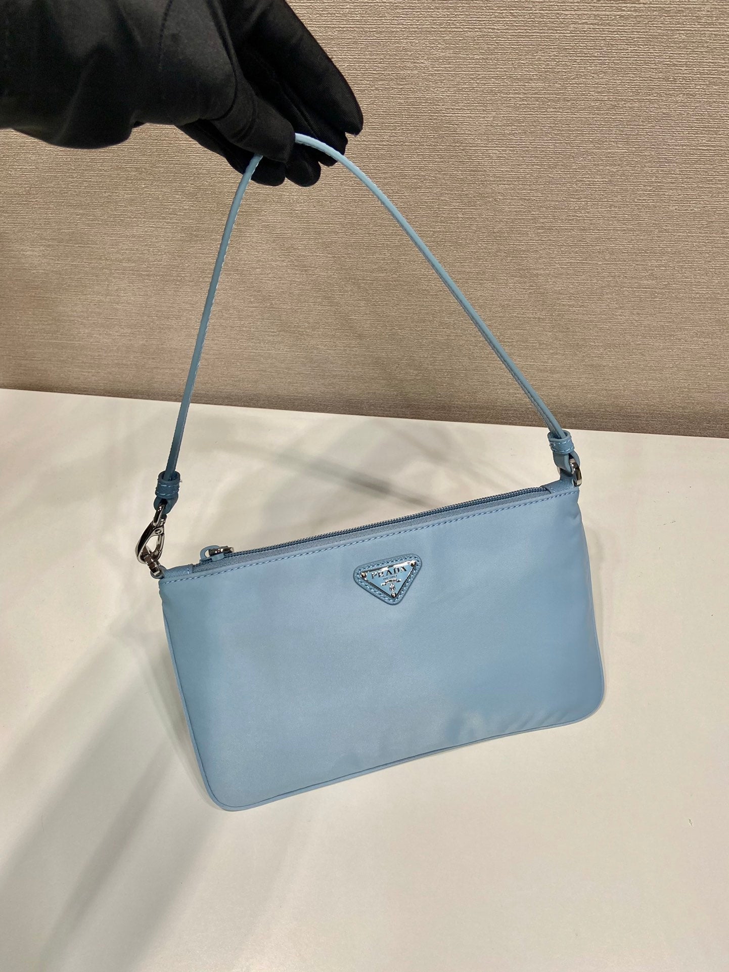 SHOULDER BAG 24 WITH TRIANGLE LOGO IN SKY BLUE RE-NYLON FABRIC