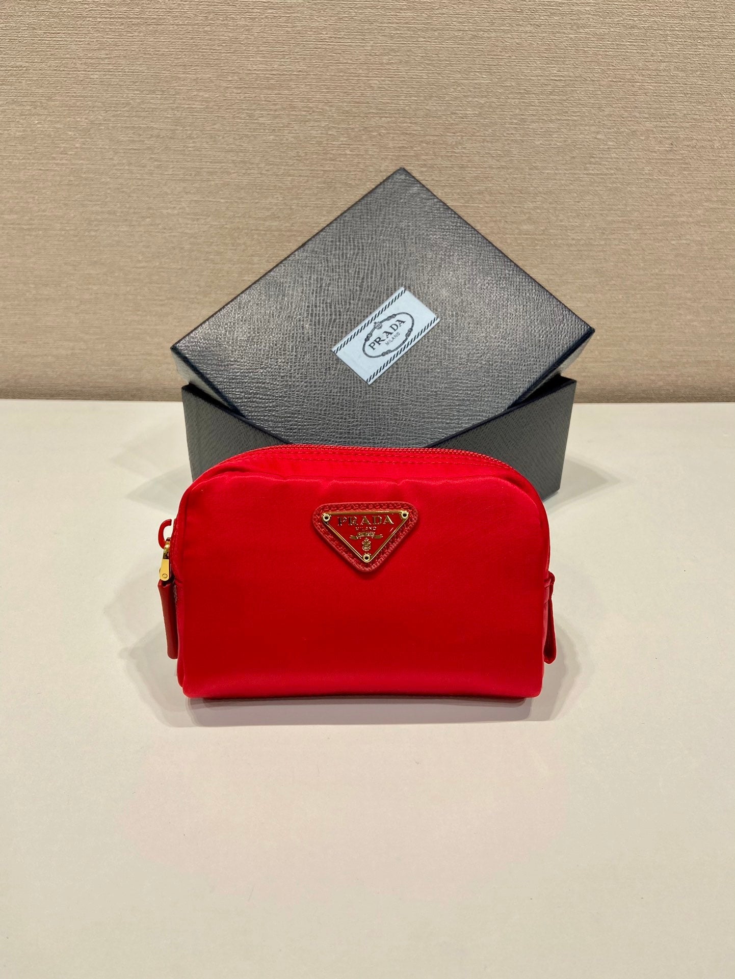 CLUTCH 12 IN PASSION RED RE-NYLON