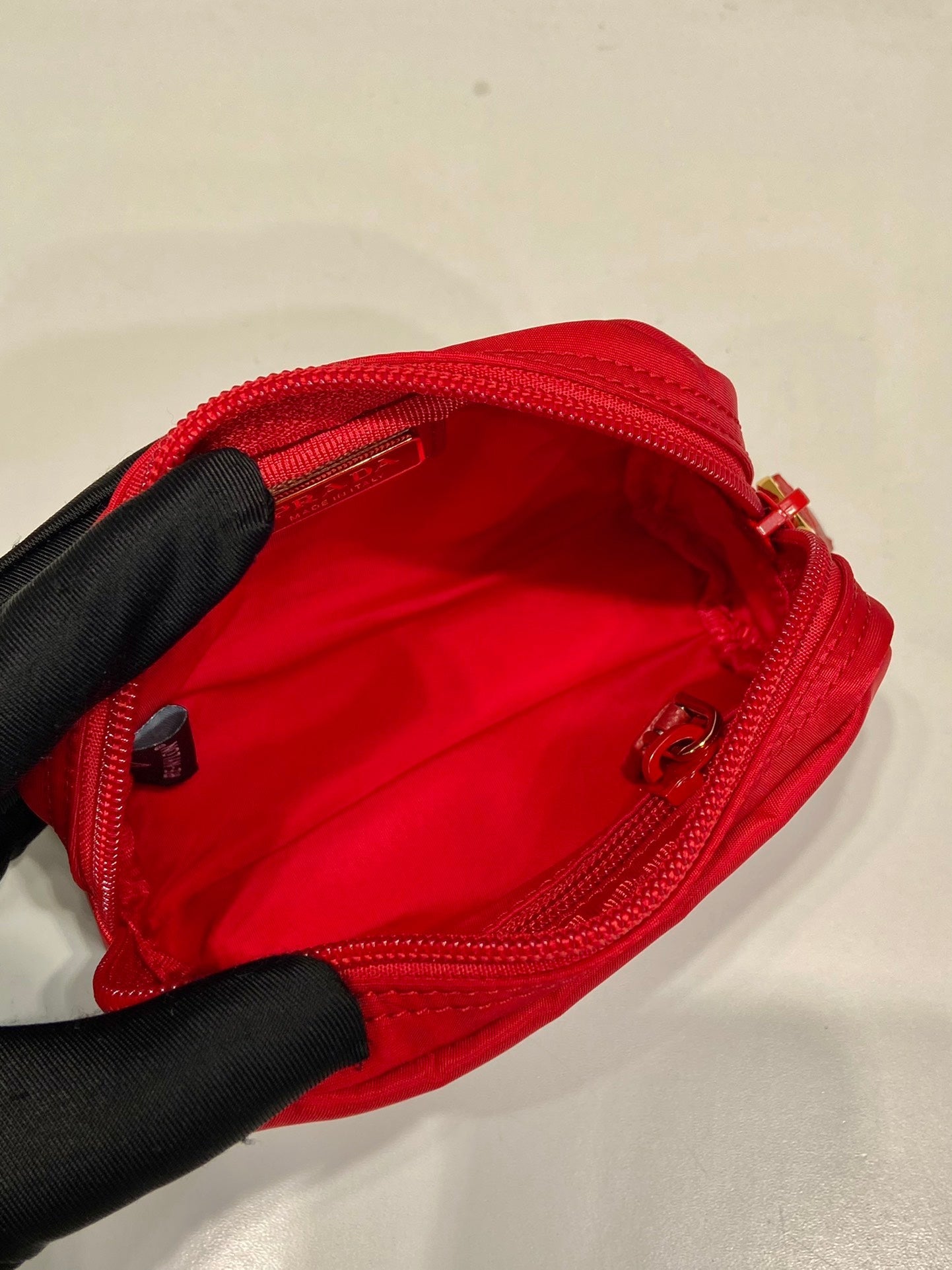 CLUTCH 12 IN PASSION RED RE-NYLON