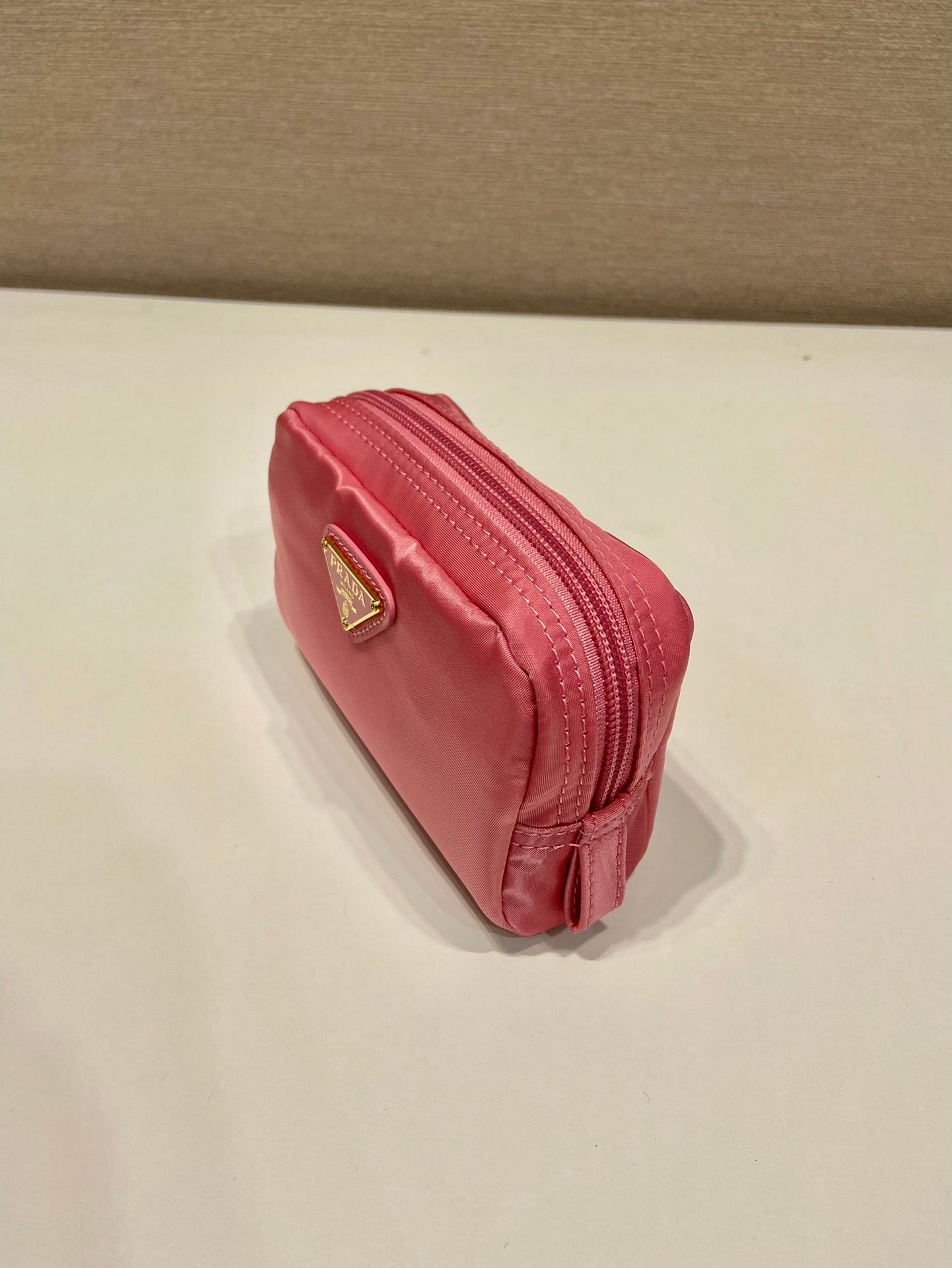 CLUTCH 12 IN CANDY PINK RE-NYLON