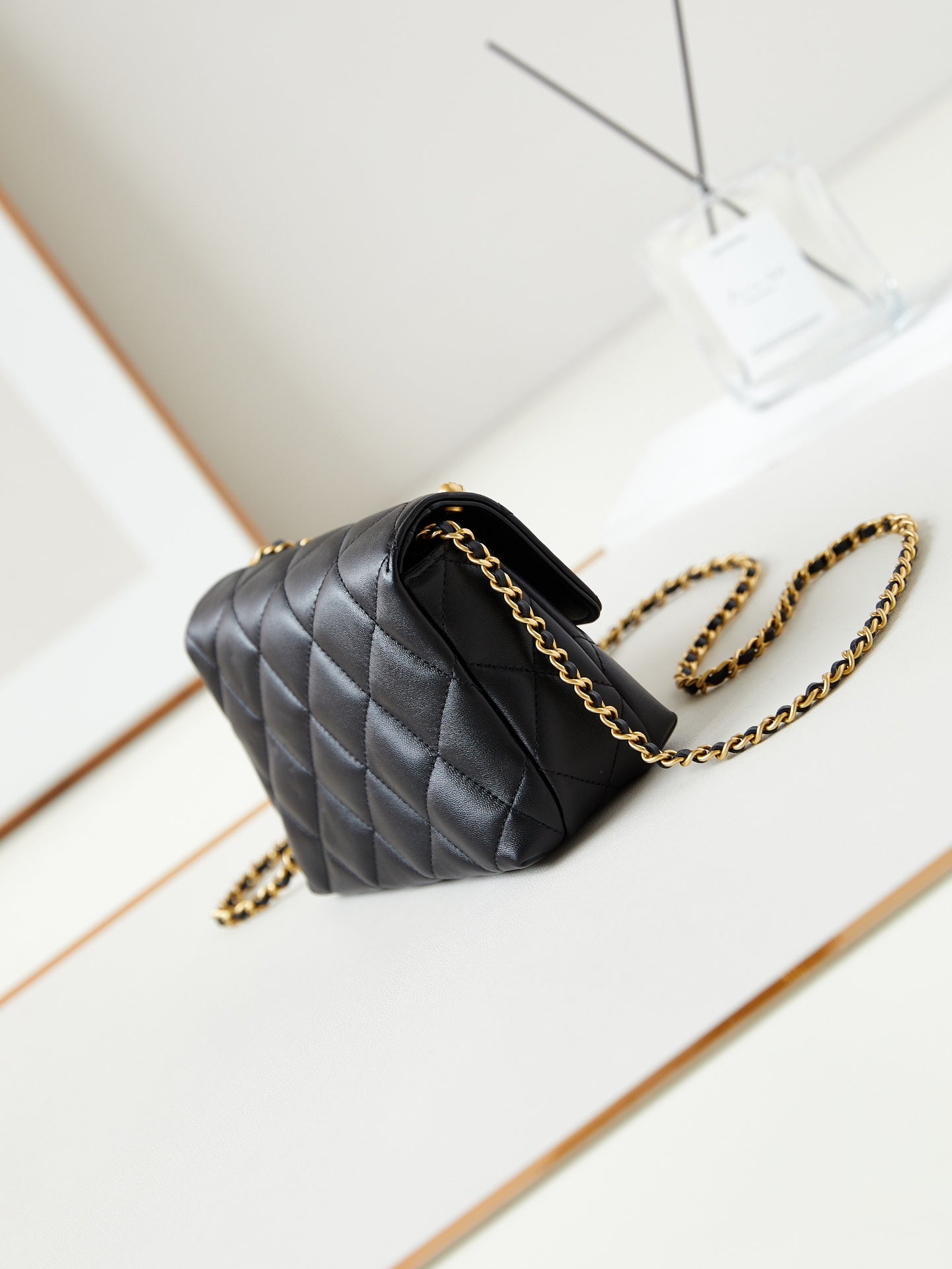 24a mini flap bag 20cm black lambskin pearl and gold hardware