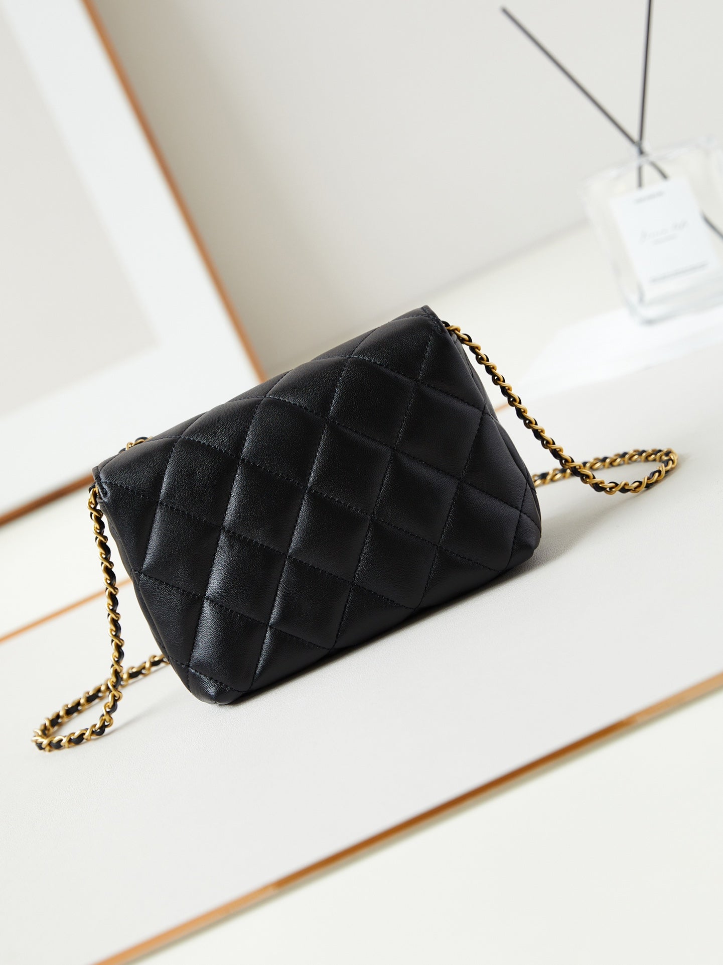 24a mini flap bag 20cm black lambskin pearl and gold hardware