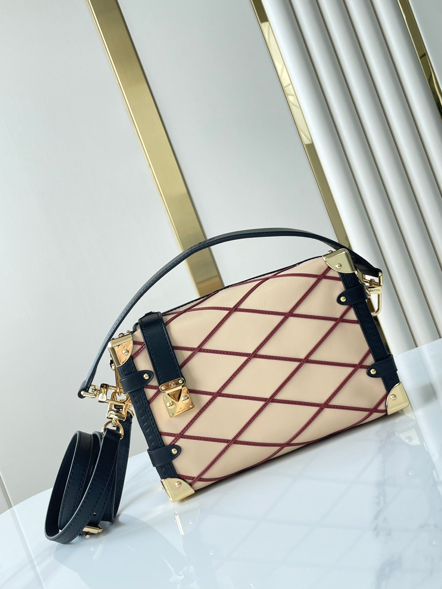 SIDE TRUNK 21 IN BEIGE RED LAMBSKIN WITH CRISS CROSS PATTERN GOLD HARDWARE