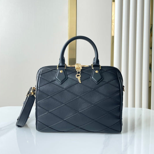 SPEEDY BANDOULIÈRE 25 WITH CRISS CROSS PATTERN IN BLACK LAMBSKIN