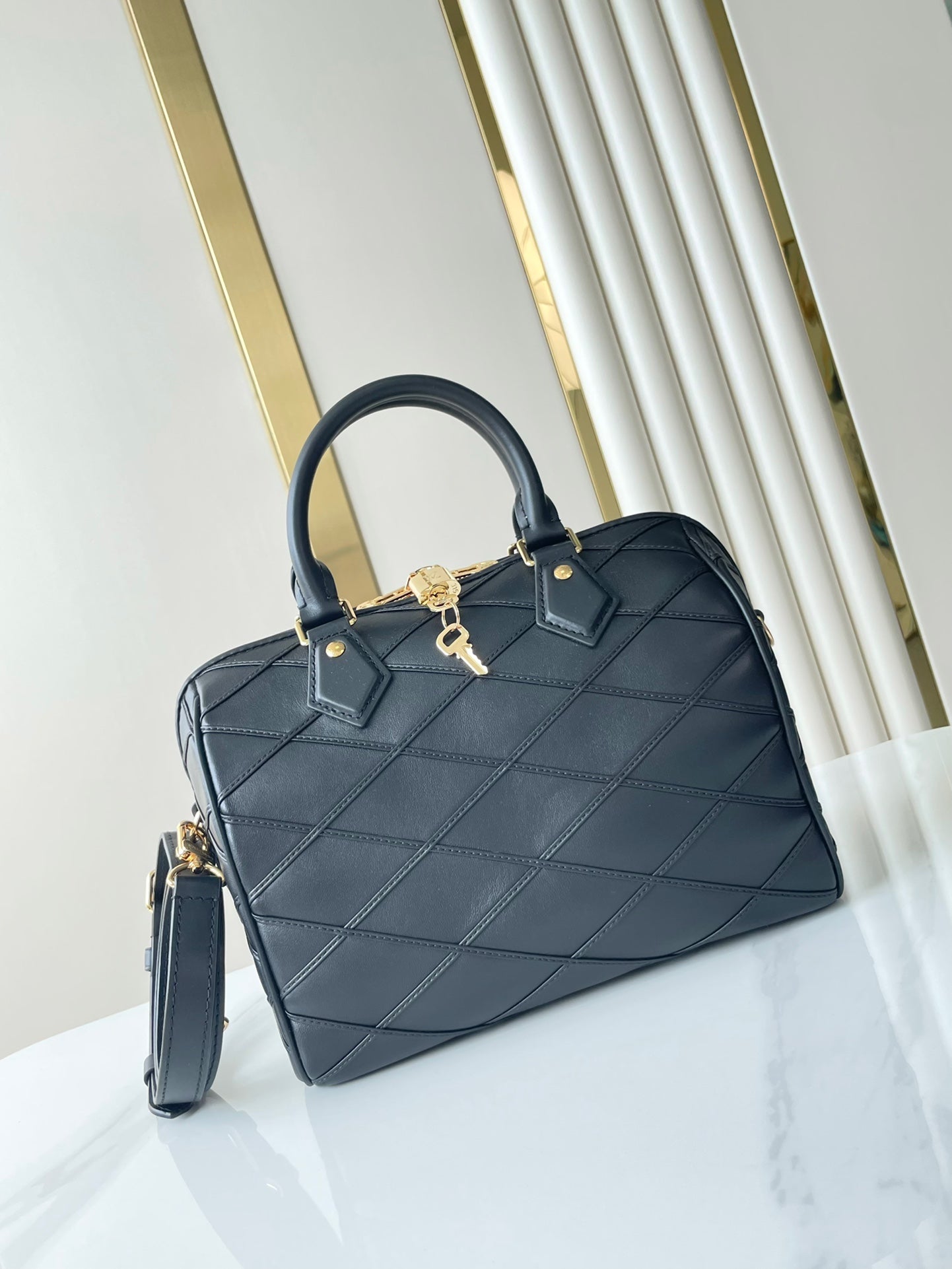 SPEEDY BANDOULIÈRE 25 WITH CRISS CROSS PATTERN IN BLACK LAMBSKIN