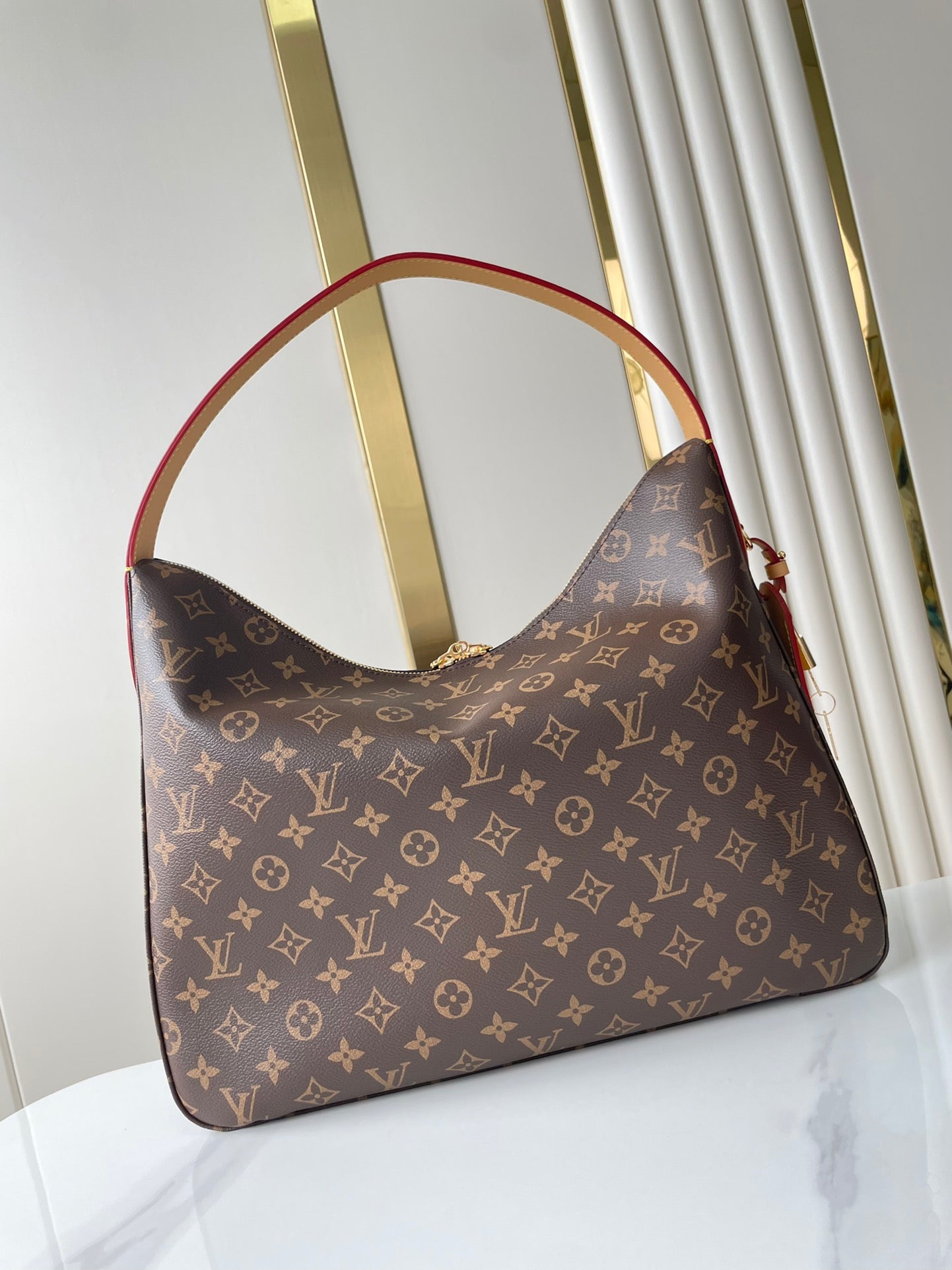 SLOUCHY MM 40 IN BROWN MONOGRAM CANVAS