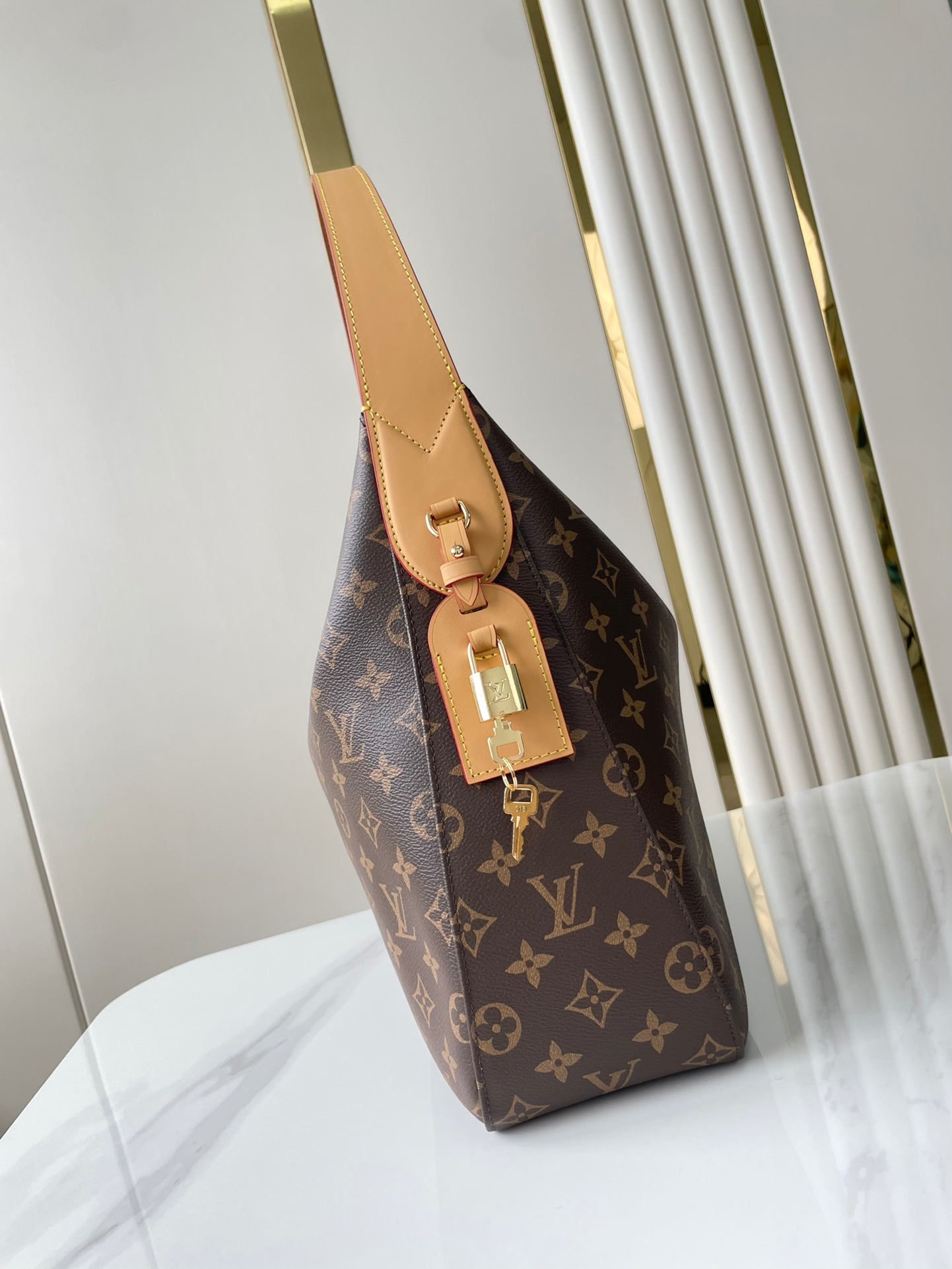 SLOUCHY MM 40 IN BROWN MONOGRAM CANVAS