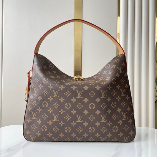 SLOUCHY MM 40 IN BROWN MONOGRAM CANVAS