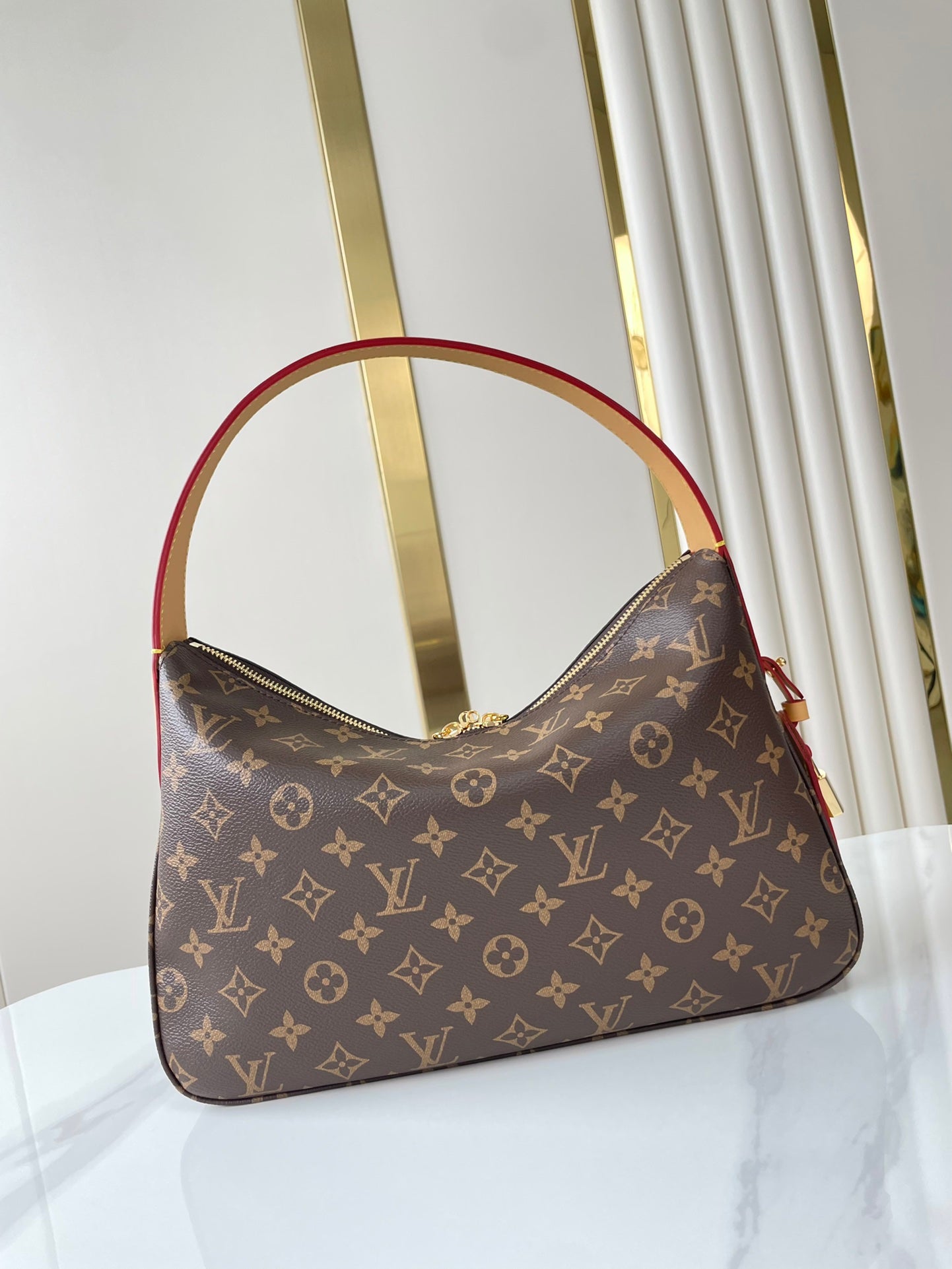 SLOUCHY PM 33 IN BROWN MONOGRAM CANVAS