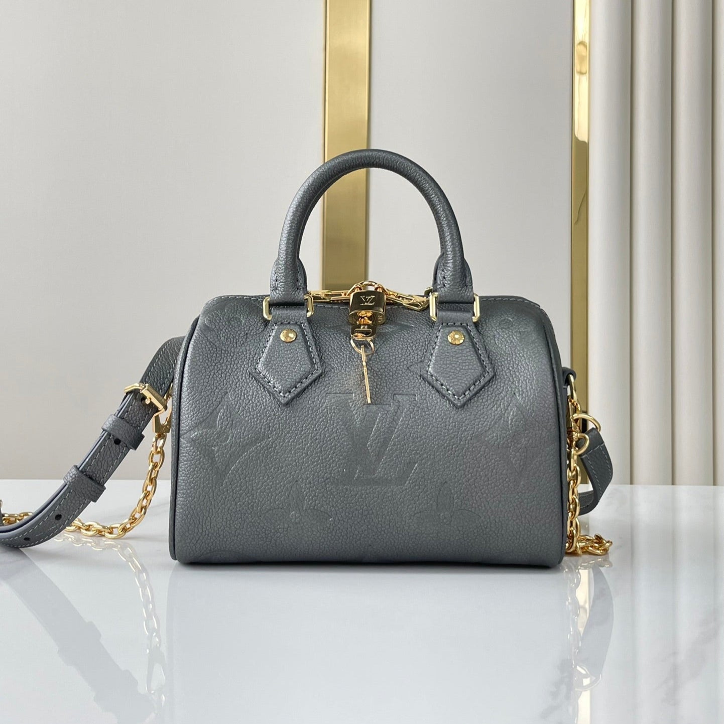 SPEEDY BANDOULIÈRE 20 IN GUN METAL MONOGRAM EMPREINTE GOLD HARDWARE