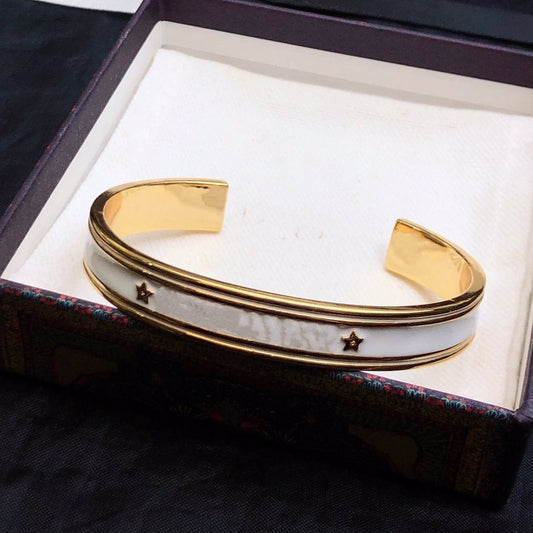 CODE BANGLE GOLD WHITE METAL AND LACQUER BRACELET