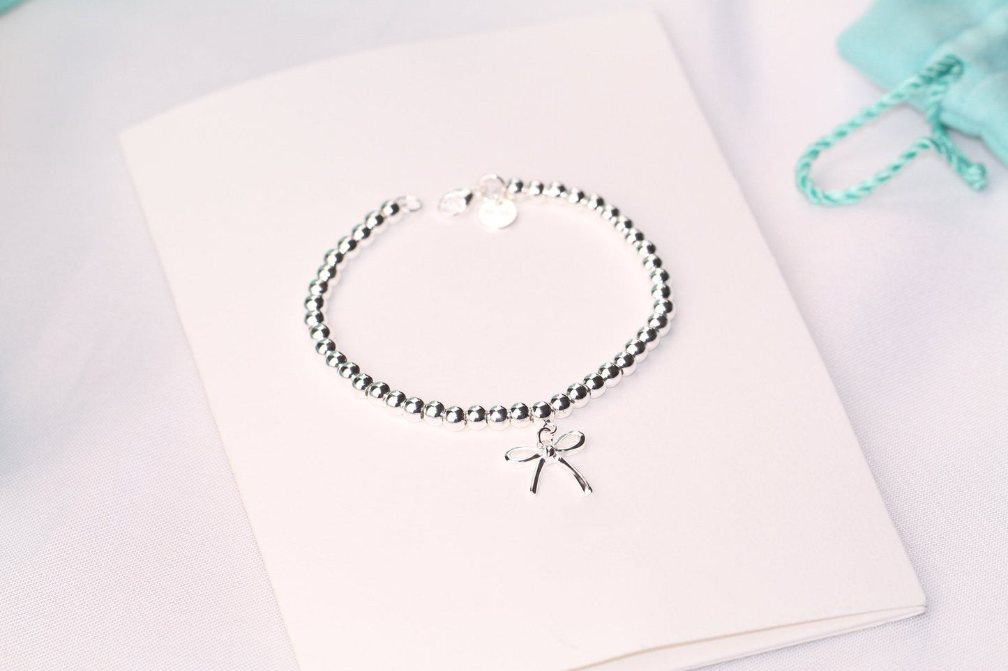 STERLING SILVER BOW BEAD BRACELET