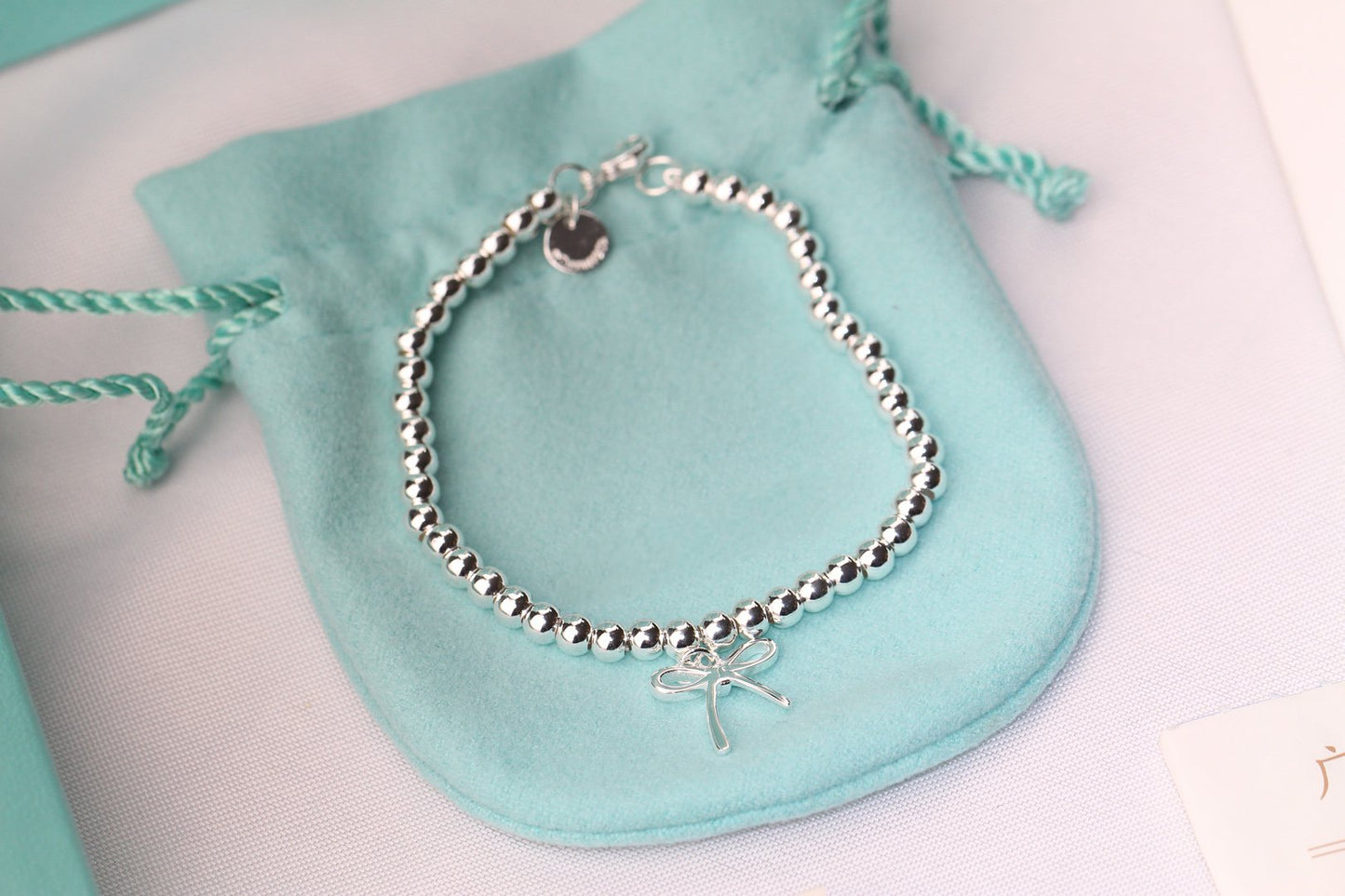 STERLING SILVER BOW BEAD BRACELET