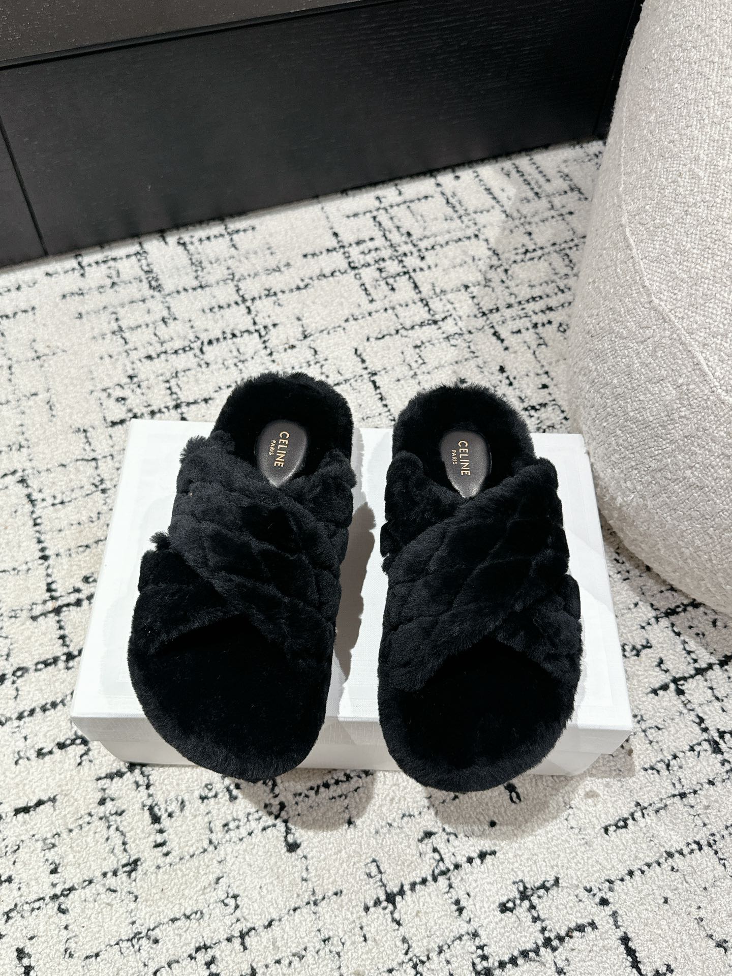 CROSS STRAP SLIPPER IN BLACK SHEARLING