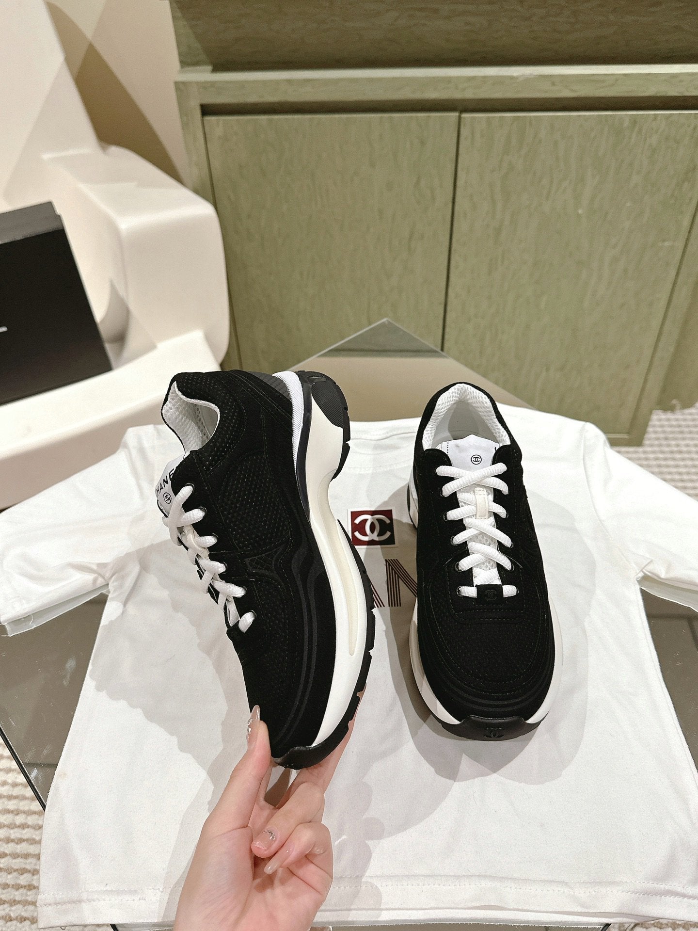 cc trainer black white fabric