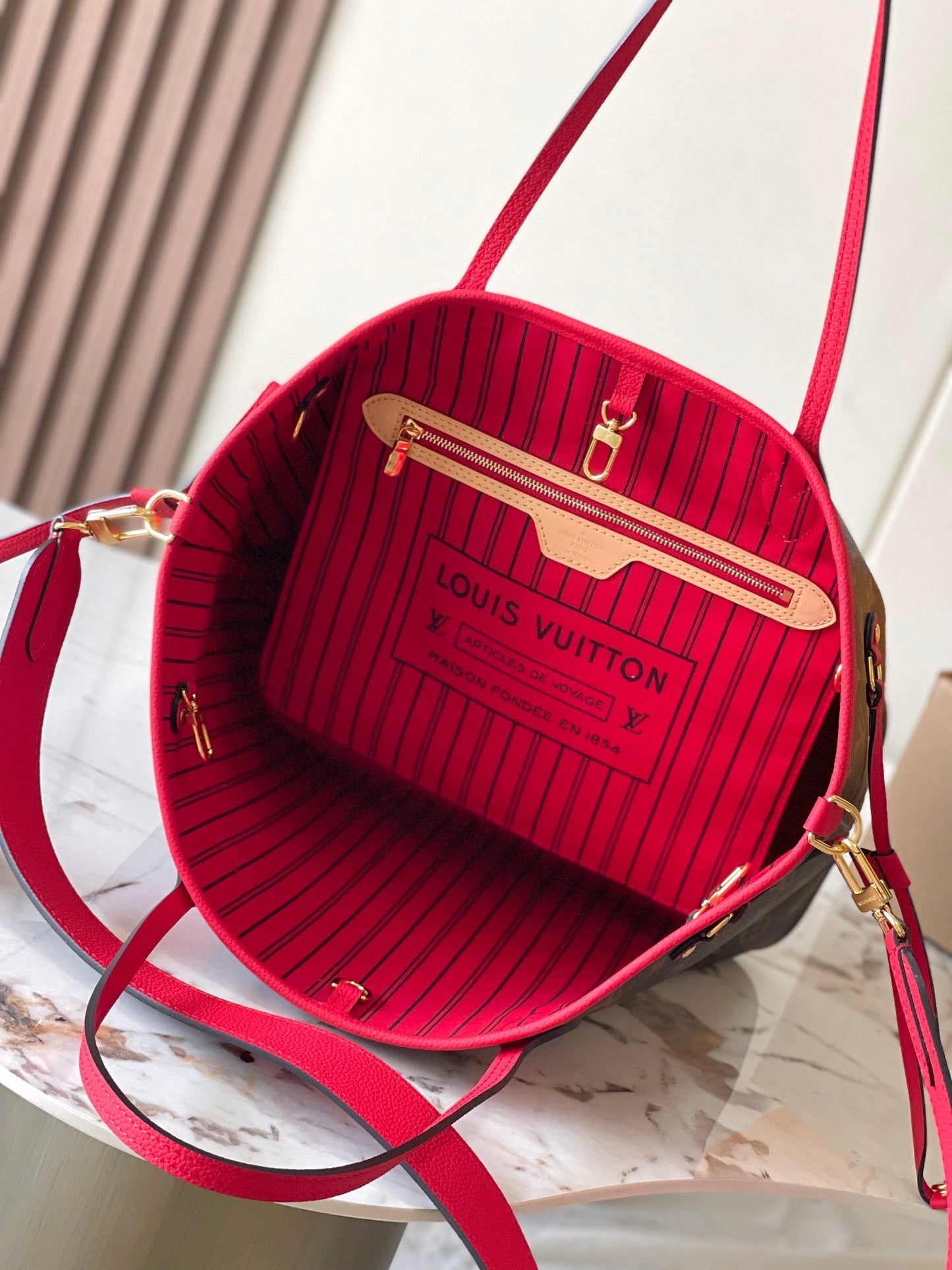 Reversible Neverfull MM 31 Inside Out Red Handle