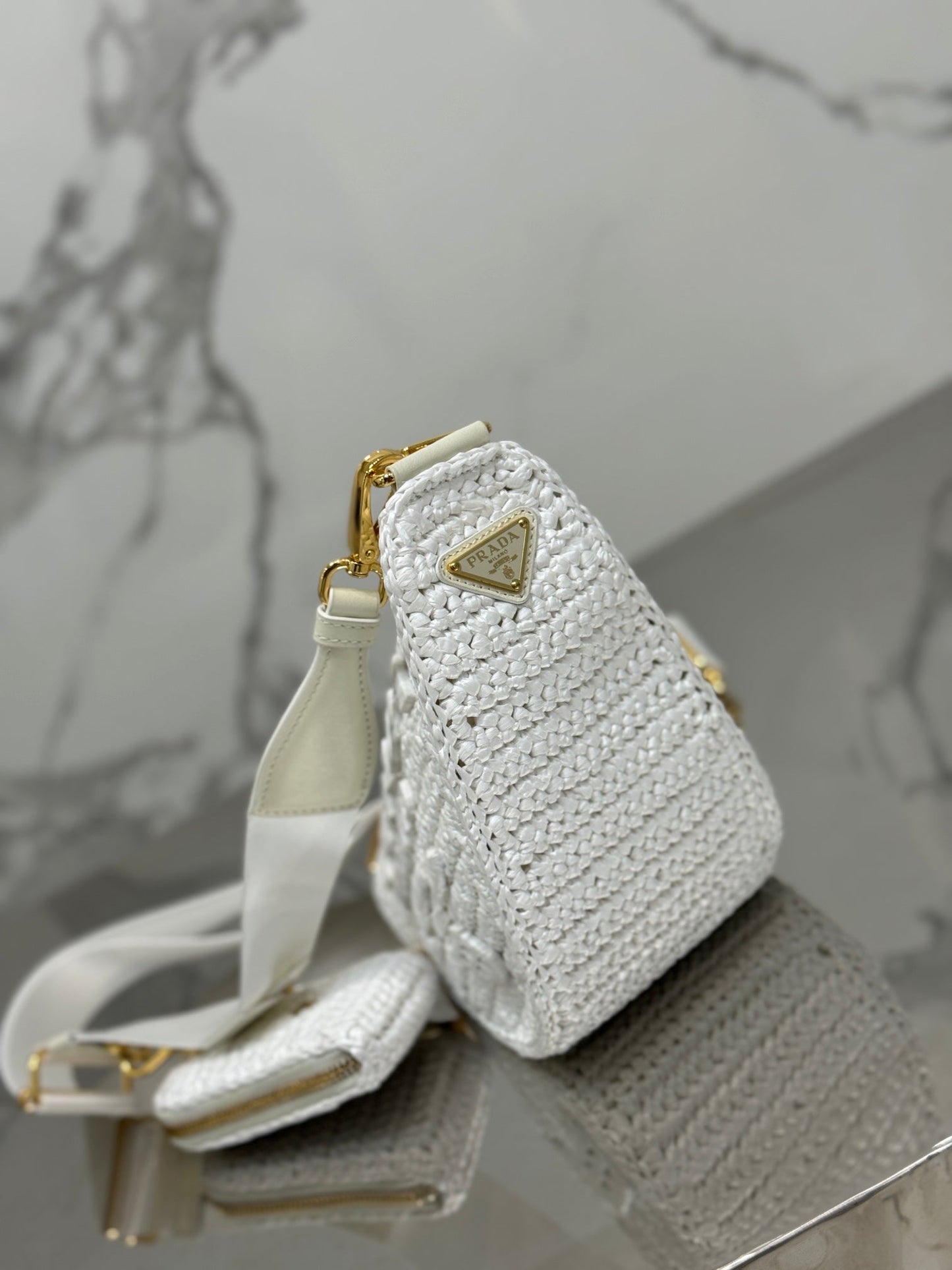 CROCHET TRIANGLE BAG 26 IN WHITE RAFFIA GOLD HARDWARE