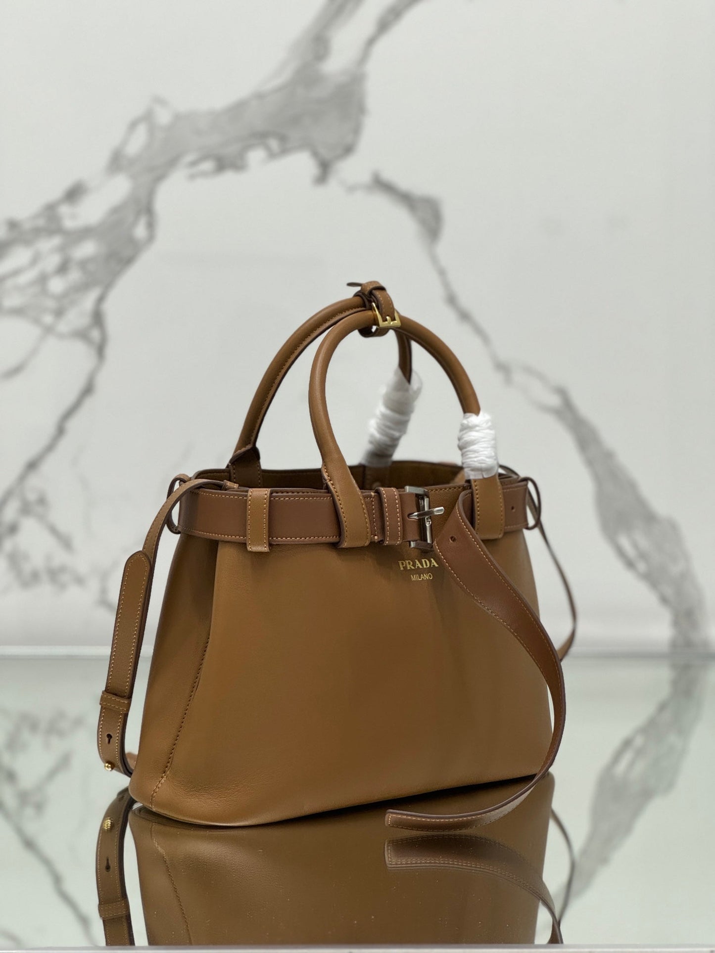 TOTE BAG WITH BELT 32 IN CIDER BROWN IMPORTED CALFSKIN