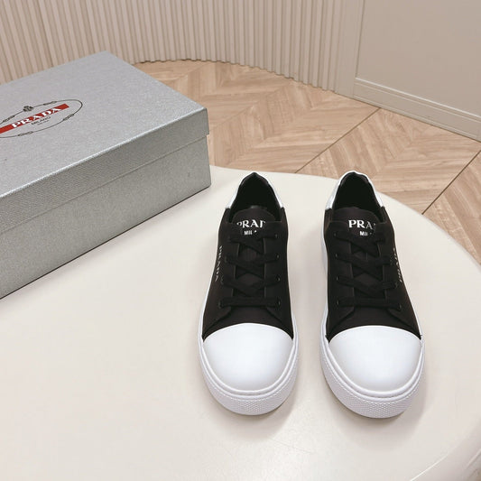 PRA LOGO OUTLET BASIC SNEAKERS BLACK AND WHITE TOE CALFSKIN