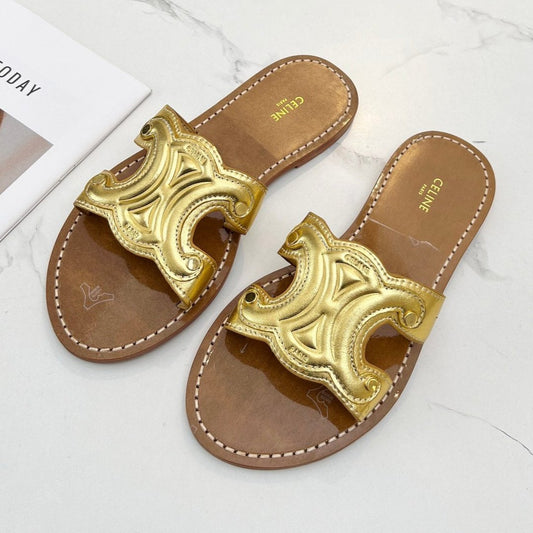 TRIOMPHE SLIDE IN GOLD CALFSKIN