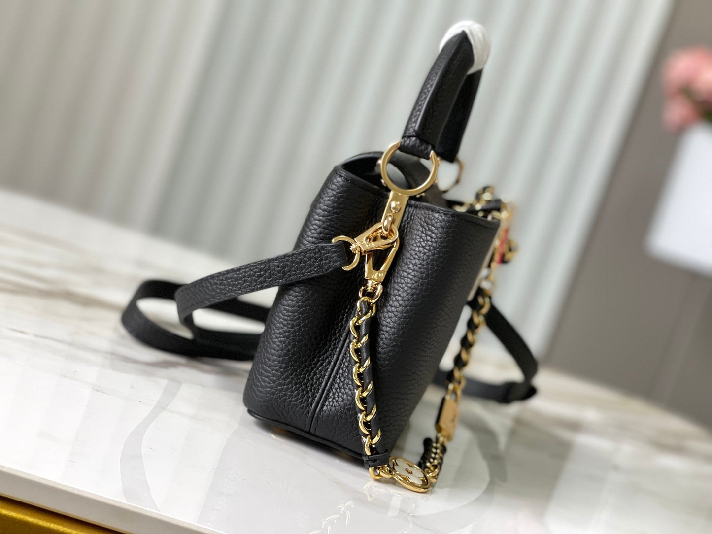 capucines mini 21 black taurillon leather gold hardware