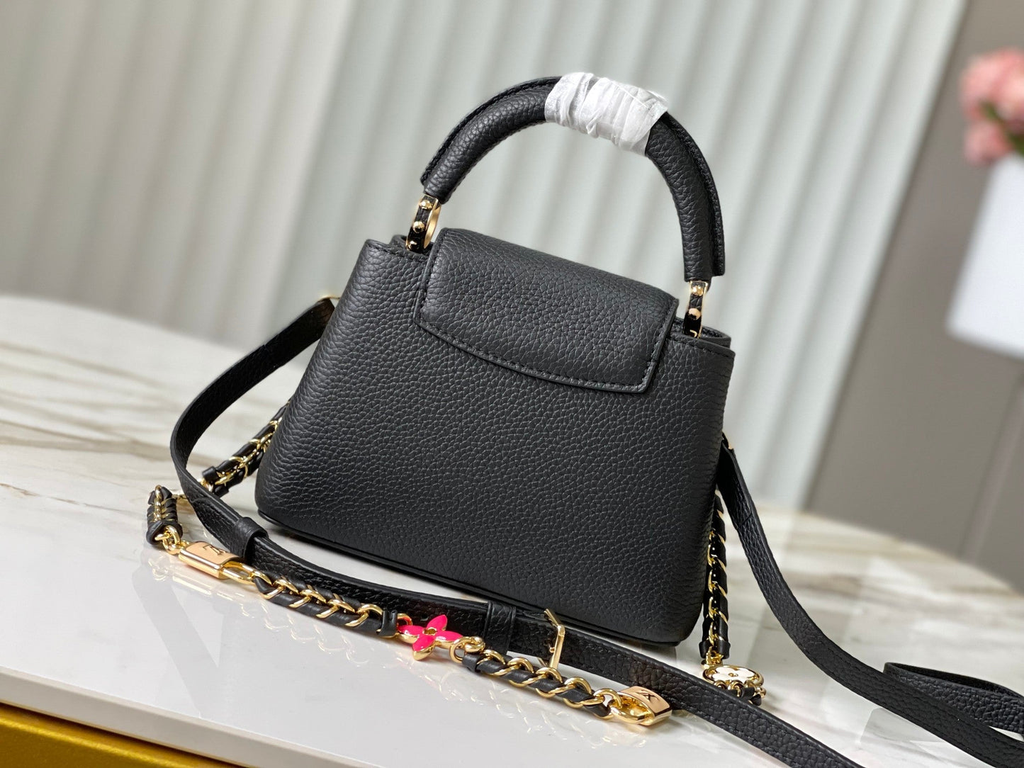 capucines mini 21 black taurillon leather gold hardware